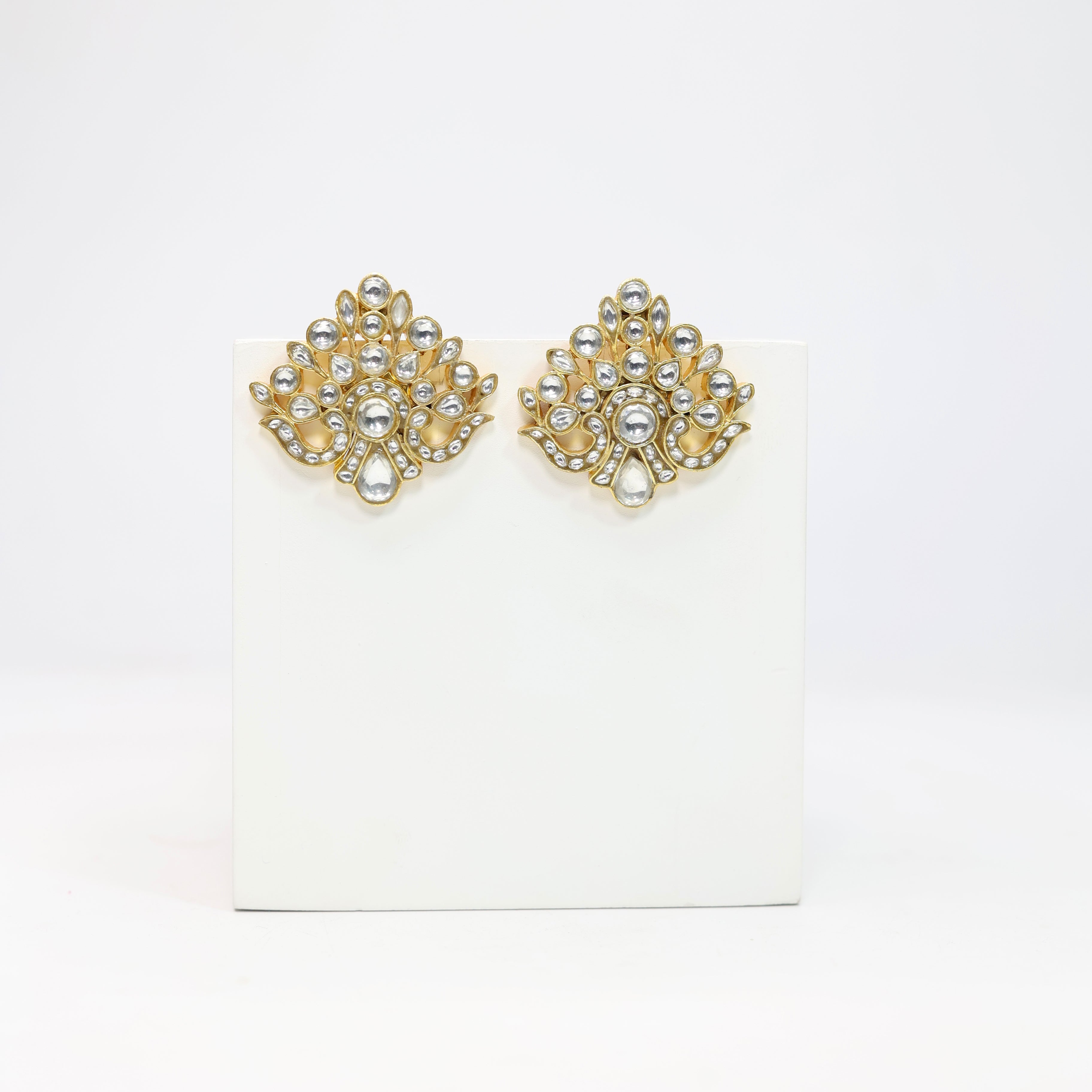 Sterling Silver oversized stud earrings with billor Polki in Peacock motif with Post-Push closure.