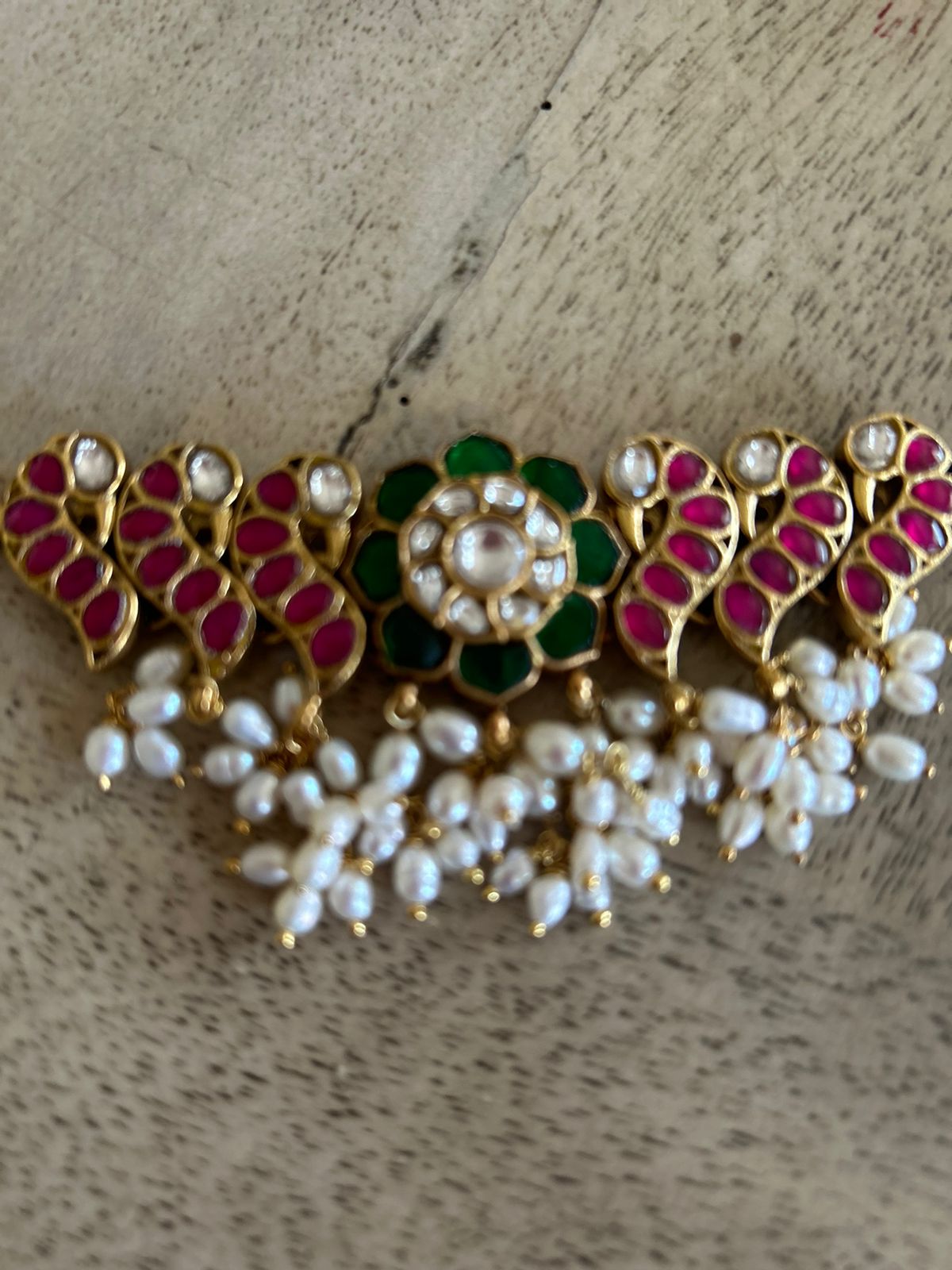 92.5 silver choker,
String closure,
Billor Polki stones,
Jadau Stones and Fresh Water Pearls.