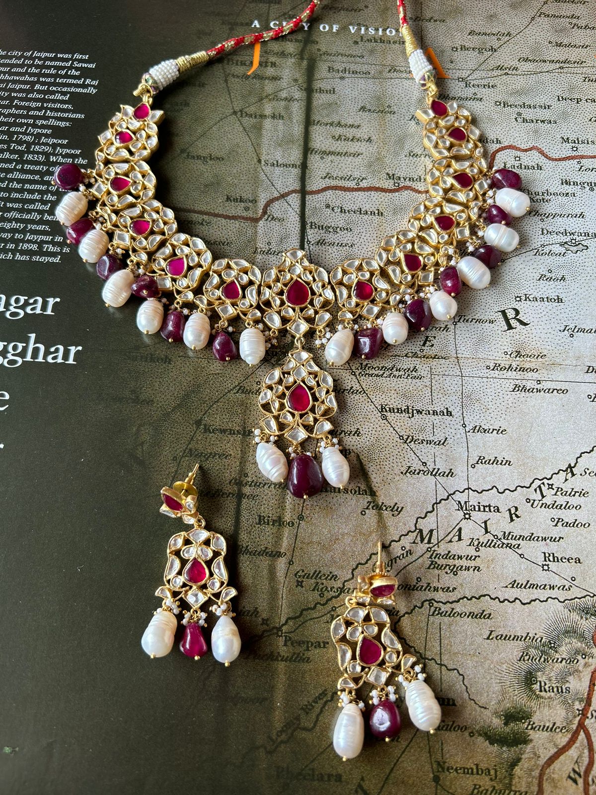Jadau choker with earrings
Sterling silver With billor Polki and pearls