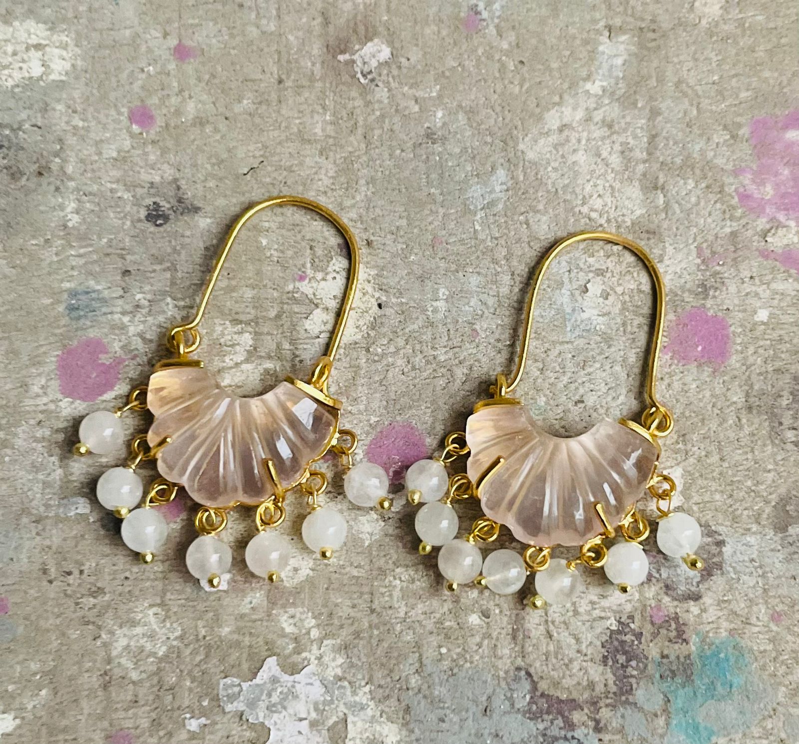 Rose quartz carved stone hoops with rose quartz drops.
Sterling silver with 1 micron gold plating.