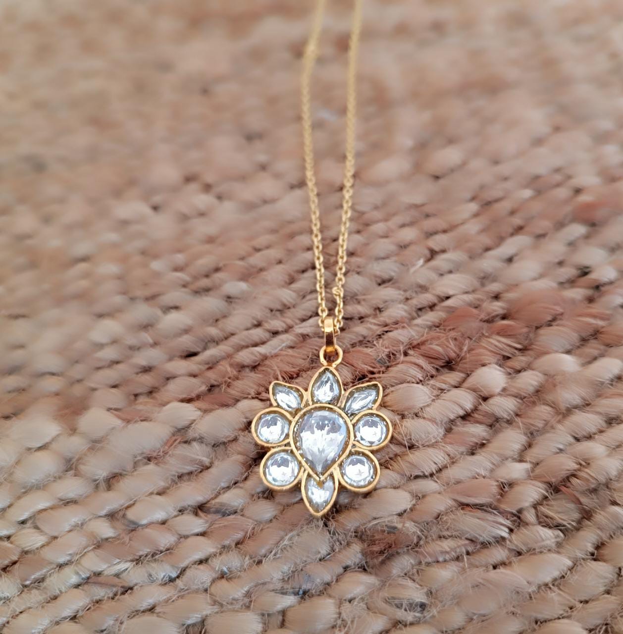 Jadau phool earrings
Billor Polki set in sterling silver 18 k gold plating