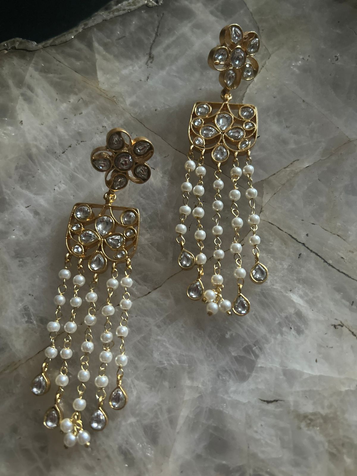 Polki pan earrings with pearls
Sterling silver with 1 micron plating