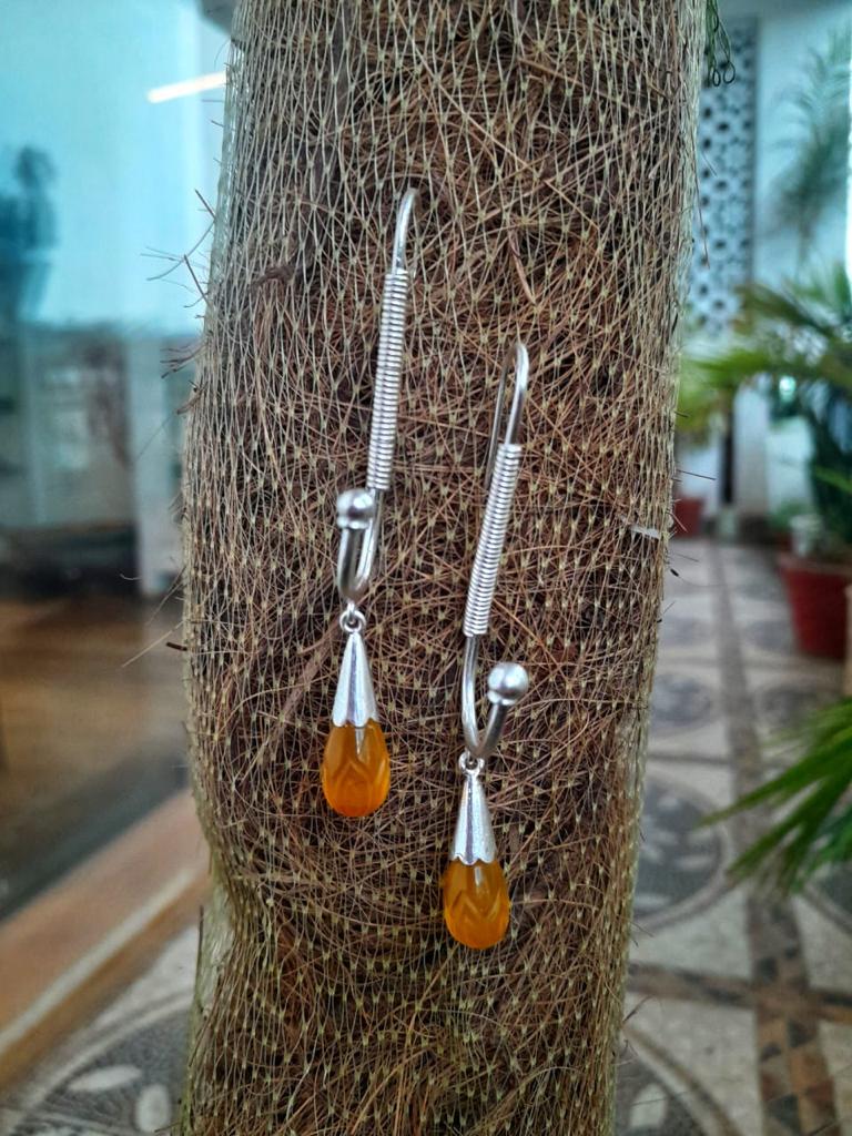 Handcrafted Sterling silver, Carnelian carved.