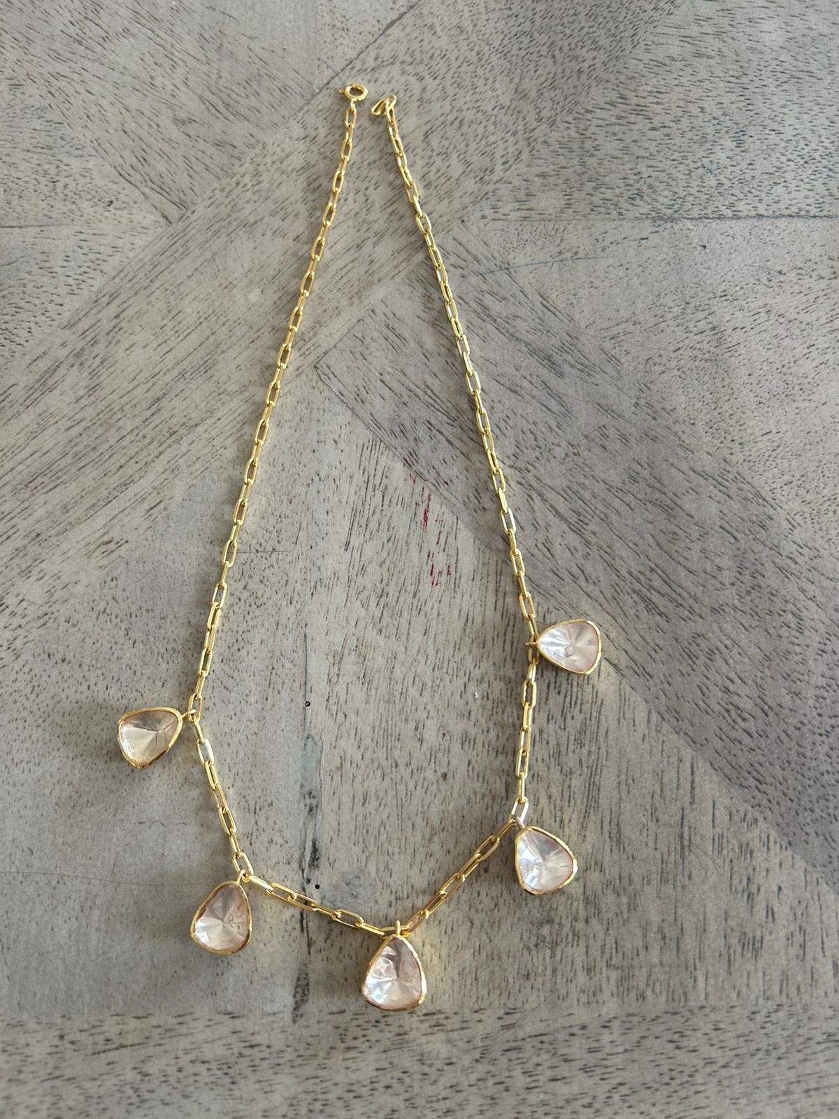 Sterling silver, 1 micron plated Moissanite stones, Length 17.5 inches Lobster closure.