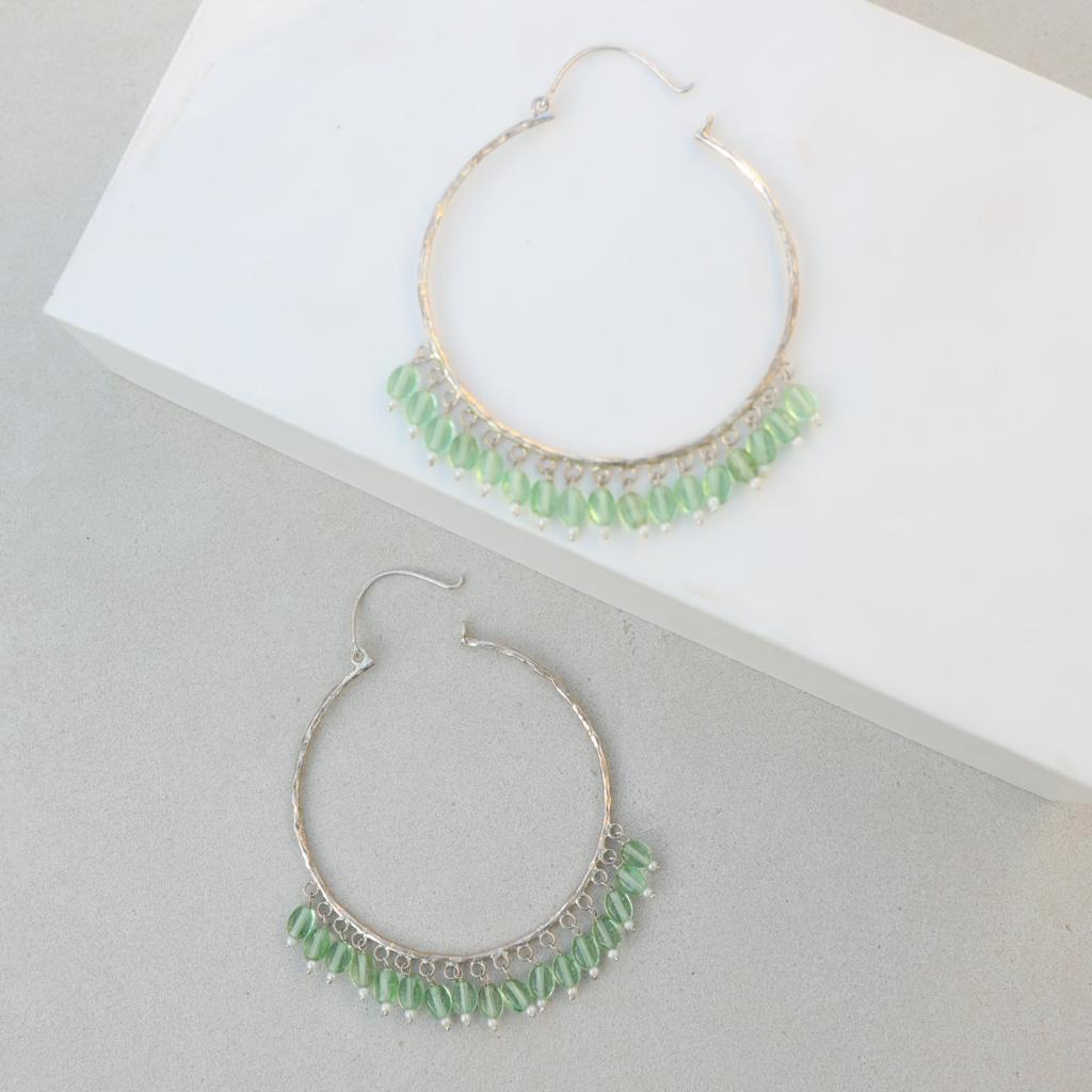 Sterling silver hoops with onyx.