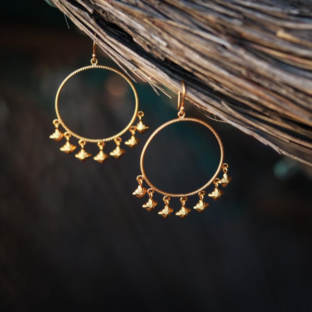 Sterling silver hoops with 1 micron gold plating.