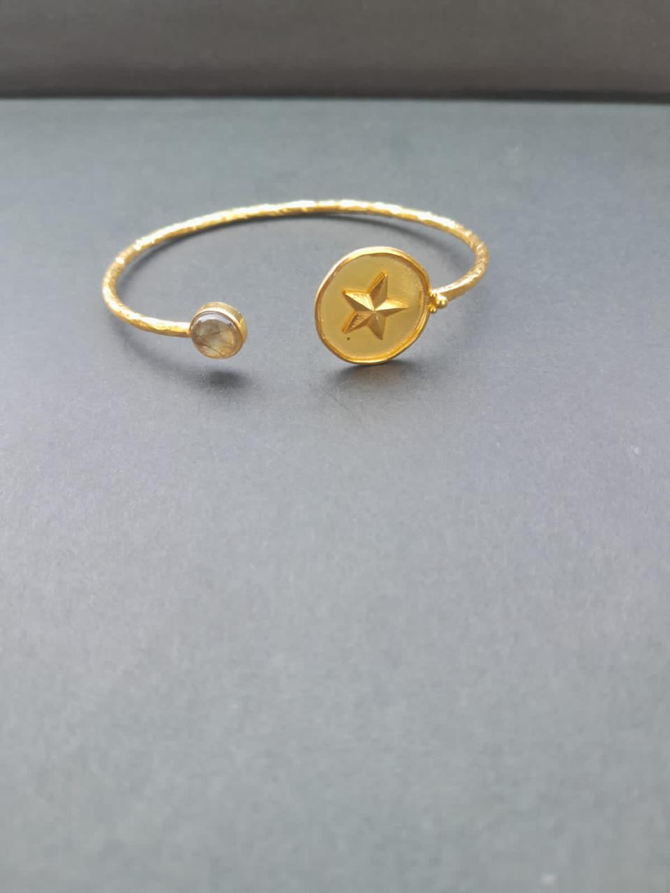 Sterling silver yellow aventurine adjustable bracelet with 24 karat gold plating.