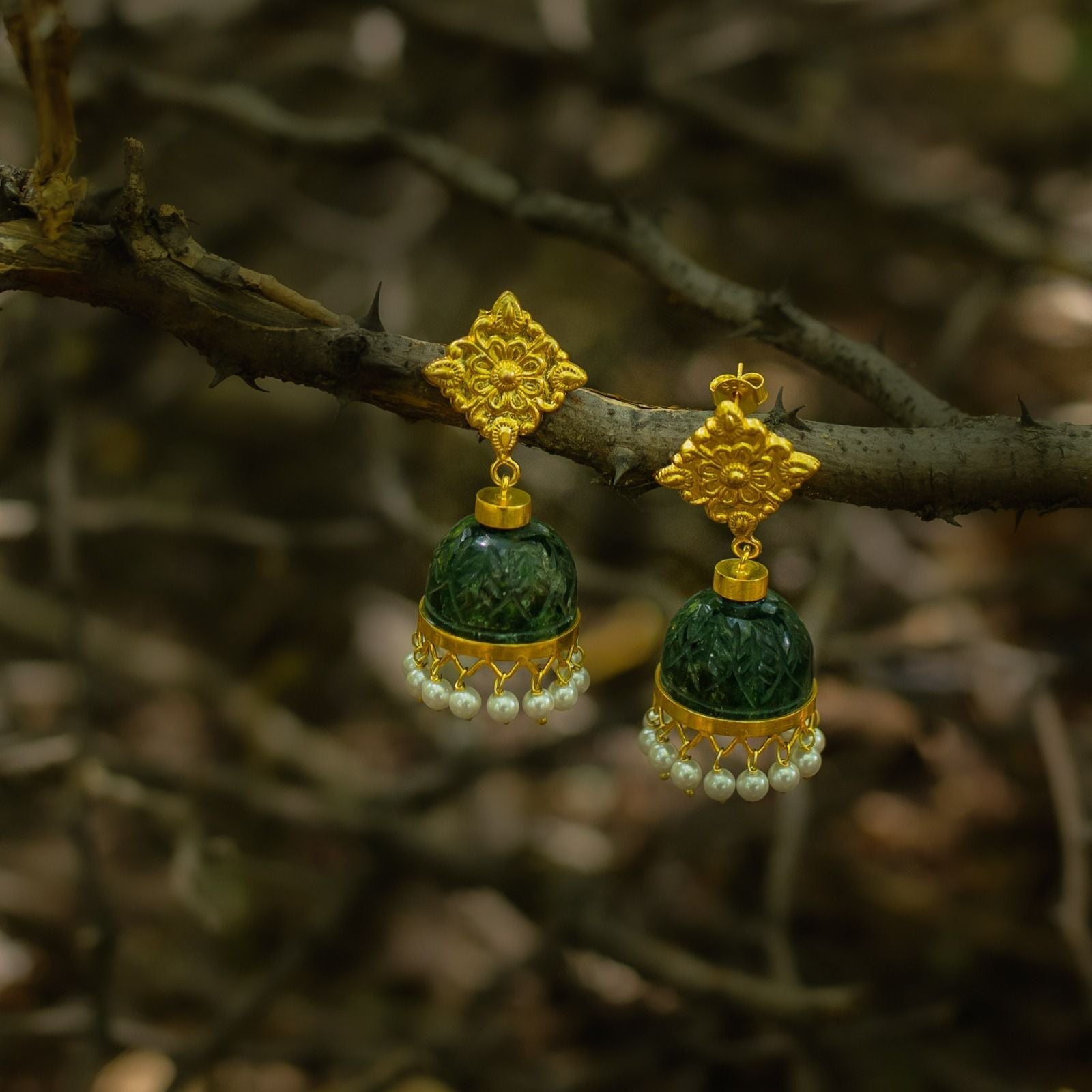Green Onyx stone Jhumka with carved stones, Patterned tops in sterling silver with gold plating.