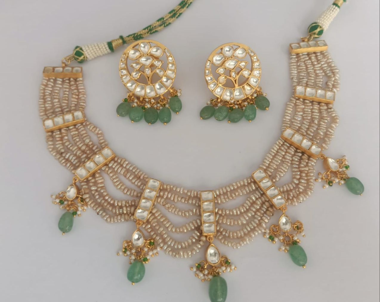 Choker and Chandbaali with 1 micron gold plating Pearls and Jadau stone Polki.