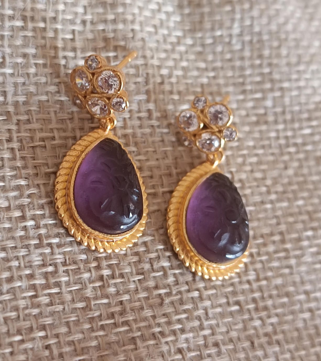 Carved Amethyst earrings with Zircon,
Sterling silver with 1 micron plating.