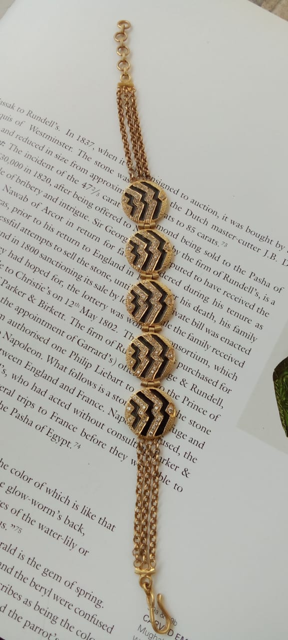 Sterling silver bracelet with Zircons and black Enamel in chevron pattern.