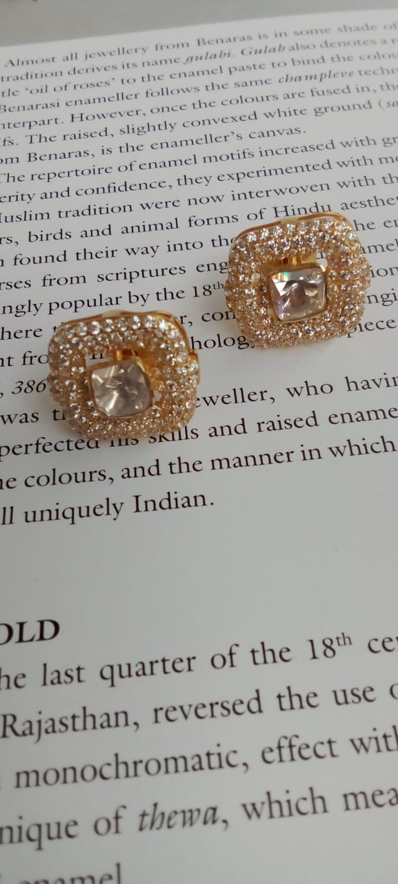 Gold plated Moissanite earrings.