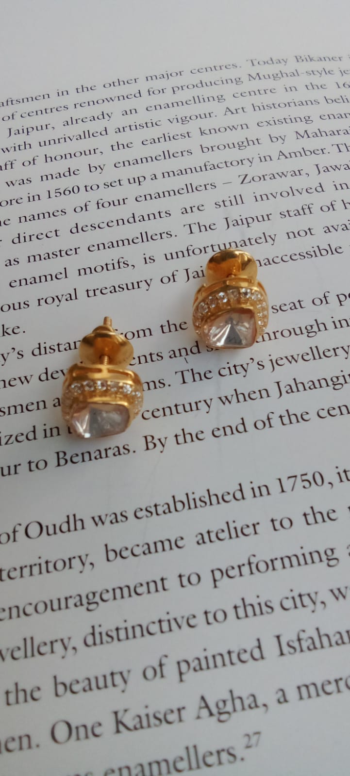 Gold plated Moissanite studs.