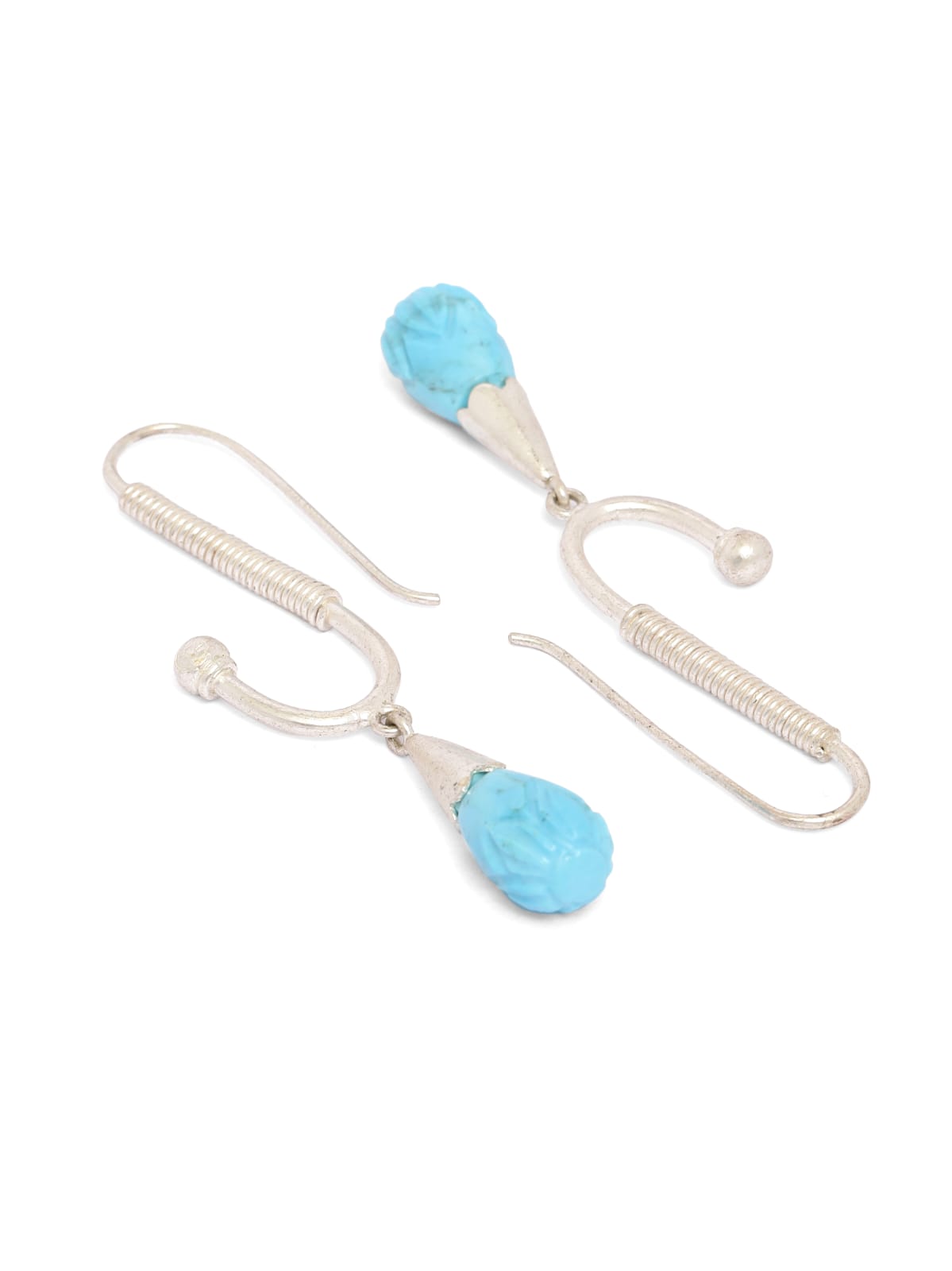 Handcrafted sterling silver, Reconstituted turquoise carved.