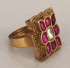Chaukor phool Ring Sterling Silver ring with red Jadau stones in 18 carat gold plating.
