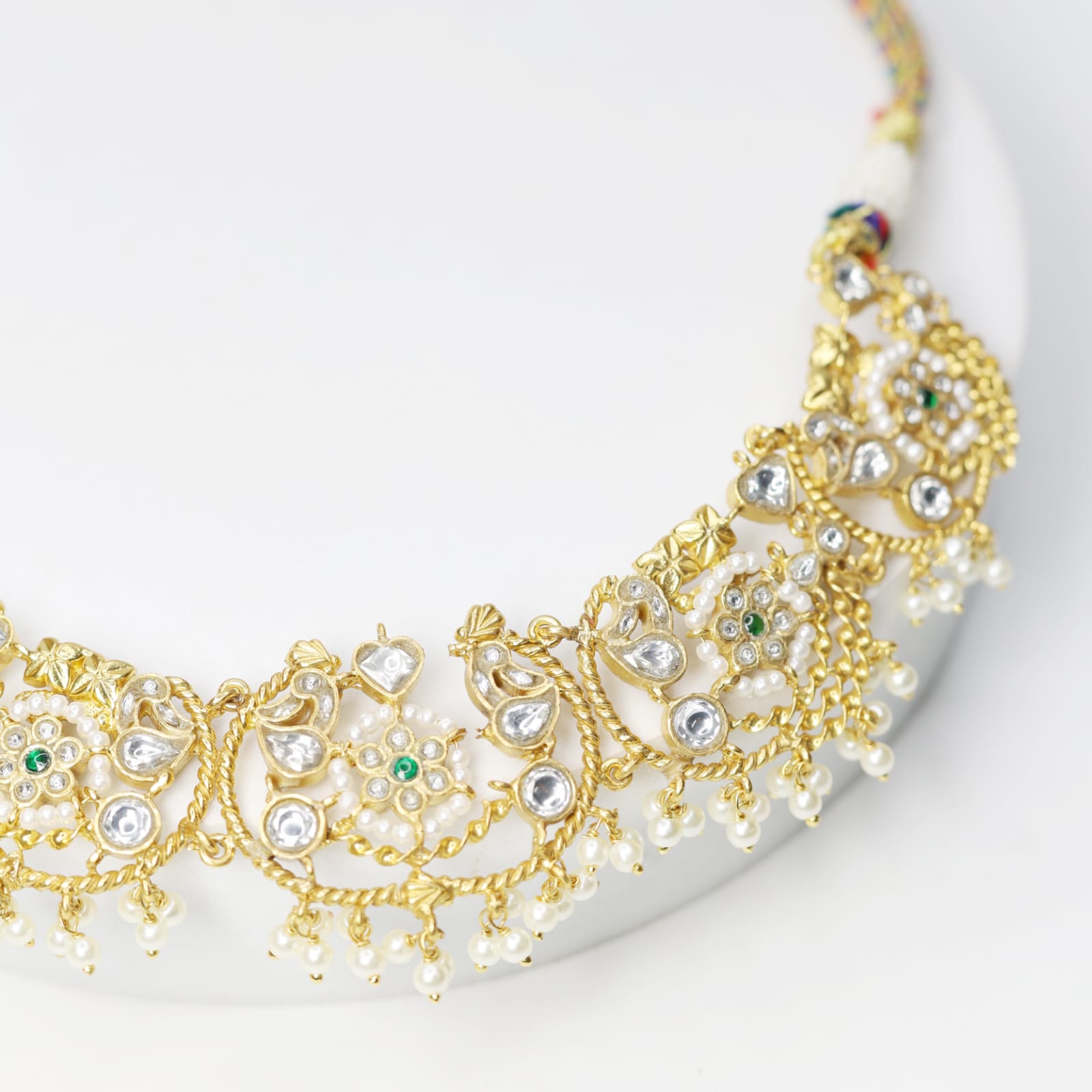 Indra necklace in 92.5 Sterling Silver with 18 karat Gold plating with Billor Polki and pearls in Sarafa closure.