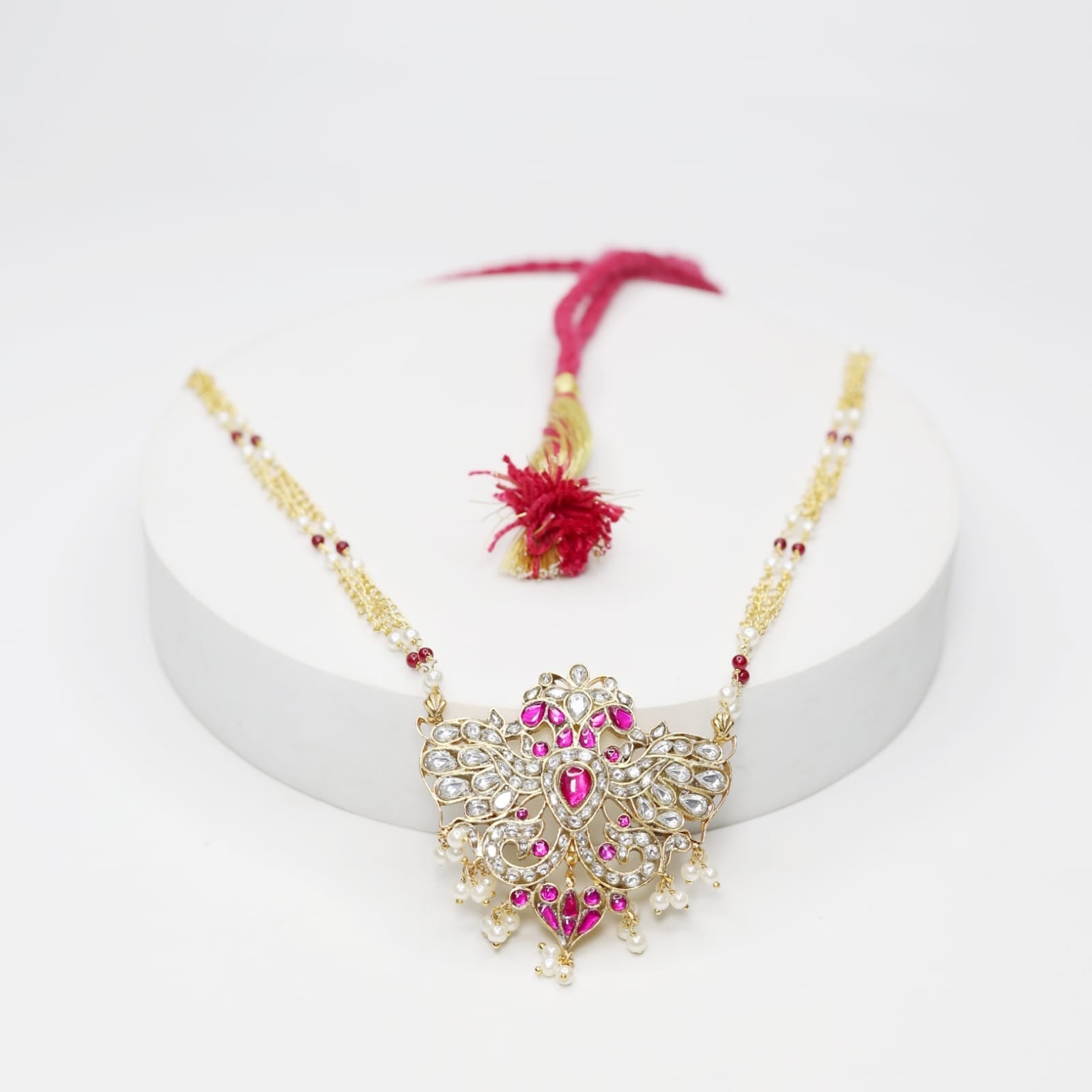 Gendabarunda necklace in 92.5 sterling Silver, 18 carat Gold plating with Billor Polki and Jadau stones chain strung with Pearls and red Onyx.