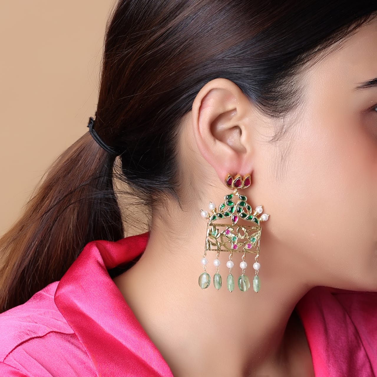 earrings with peacock and lotus motif