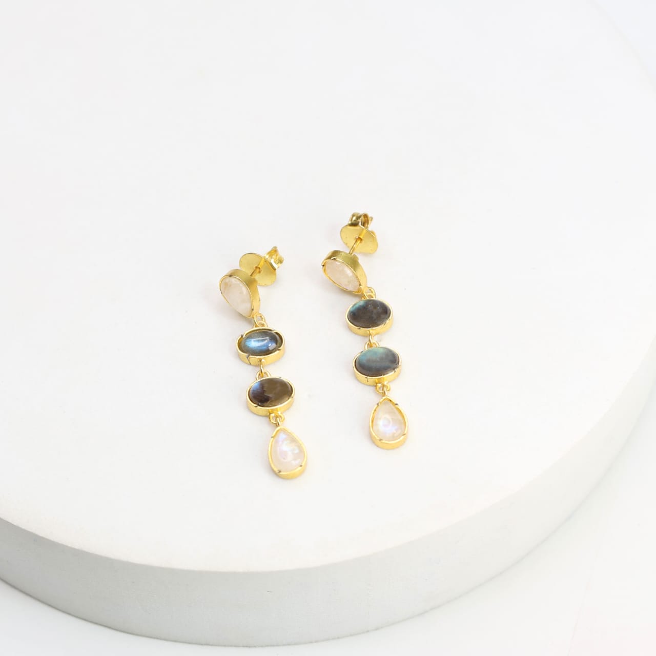 Sterling Silver stud earrings with 1 micron Gold plating set with moonstone and labradorite in Push-Post closure.
