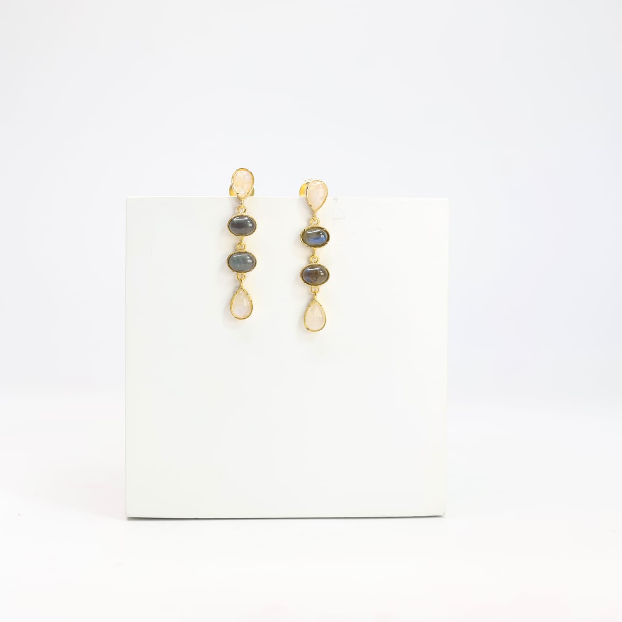 Sterling Silver stud earrings with 1 micron Gold plating set with moonstone and labradorite in Push-Post closure.