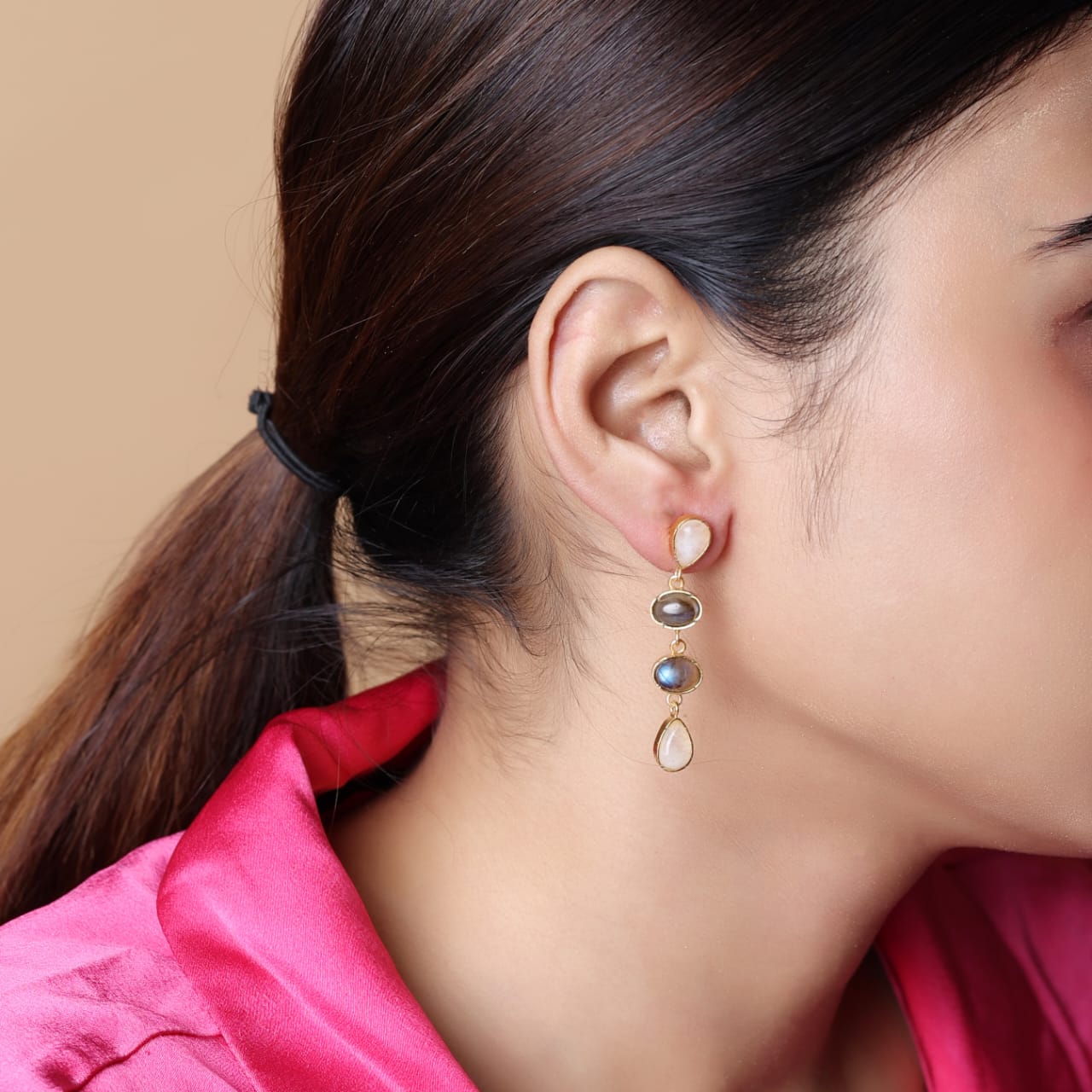 Sterling Silver stud earrings with 1 micron Gold plating set with moonstone and labradorite in Push-Post closure.