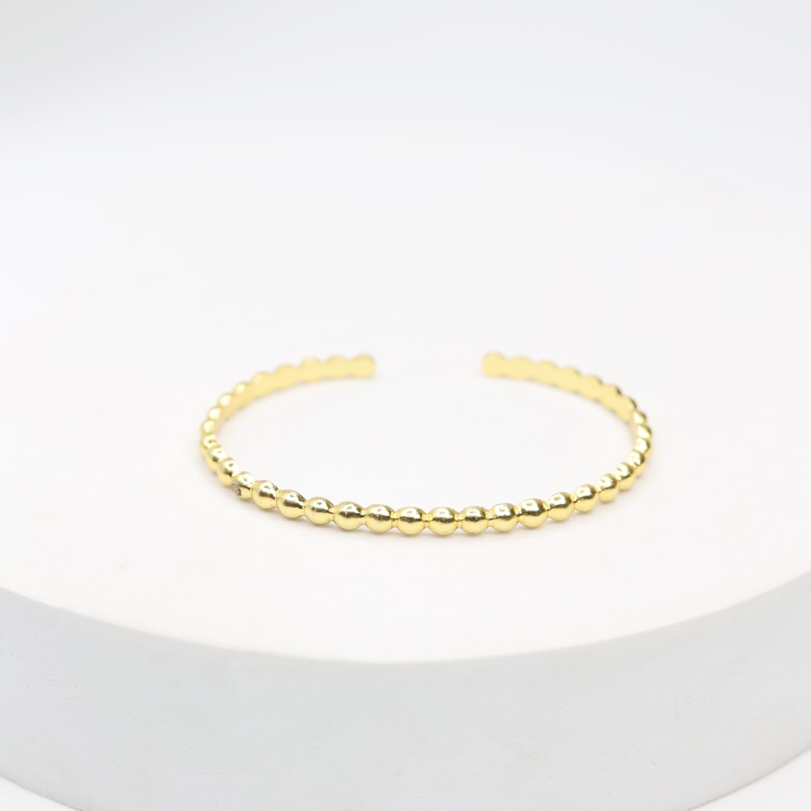 Handcrafted sterling Silver bracelet with 1 micron gold plating with
Textured open stacking.
Size- Adjustable.