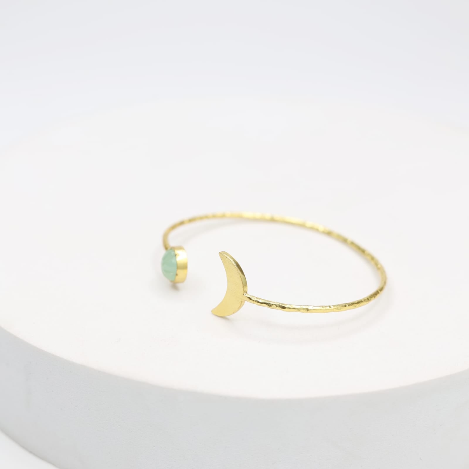 Handcrafted Crescent sterling Silver bracelet with 1 micron Gold plating, Grapes aventurine in Textured open stacking.
Size- Adjustable