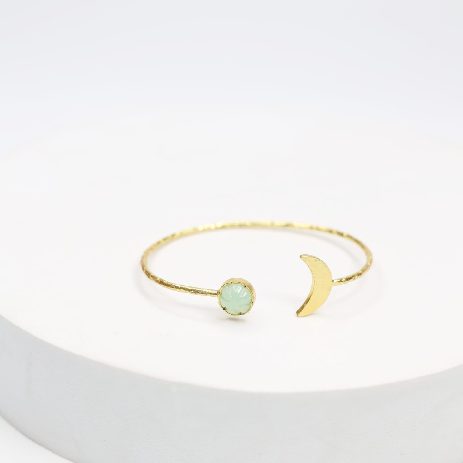 Handcrafted Crescent sterling Silver bracelet with 1 micron Gold plating, Grapes aventurine in Textured open stacking.
Size- Adjustable