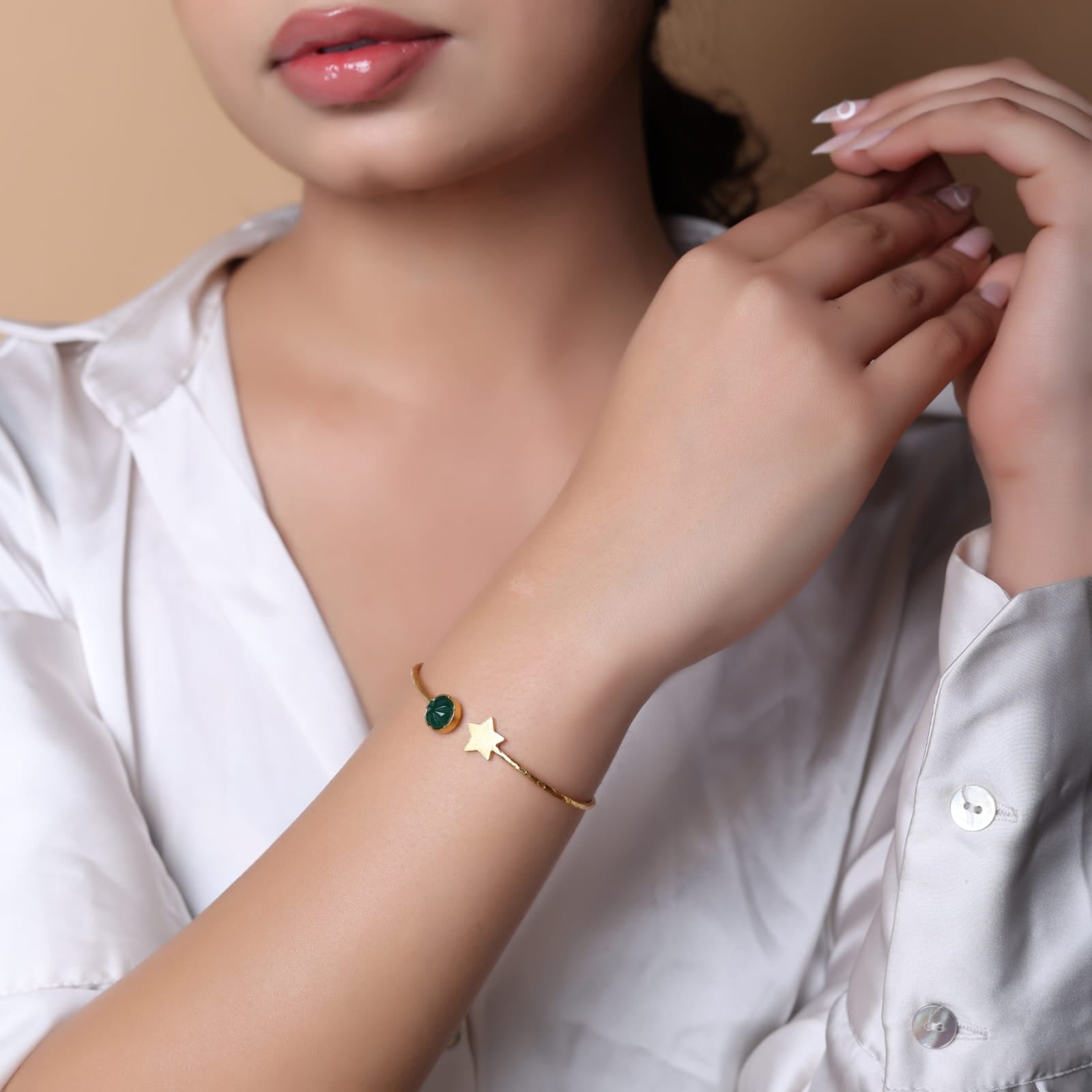 Handcrafted Star carved stone Bracelet in sterling Silver with 1 micron Gold plating.
Star and melon green onyx stone.
Open stacking bracelet.
Size- Adjustable