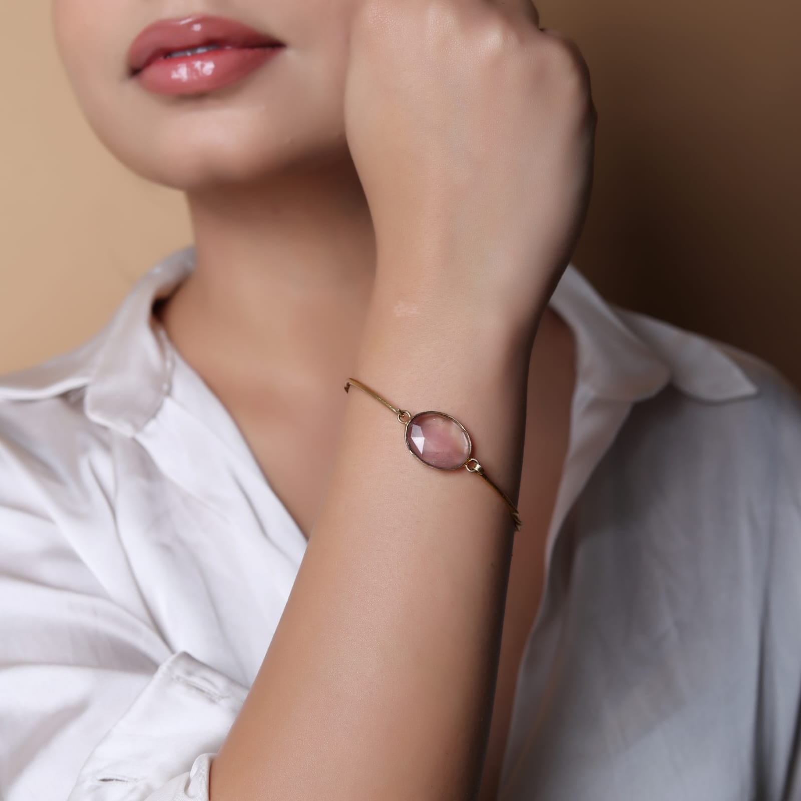 Handcrafted Amethyst bracelet in sterling silver studded with faceted amethyst stone in 1 micron gold plating.