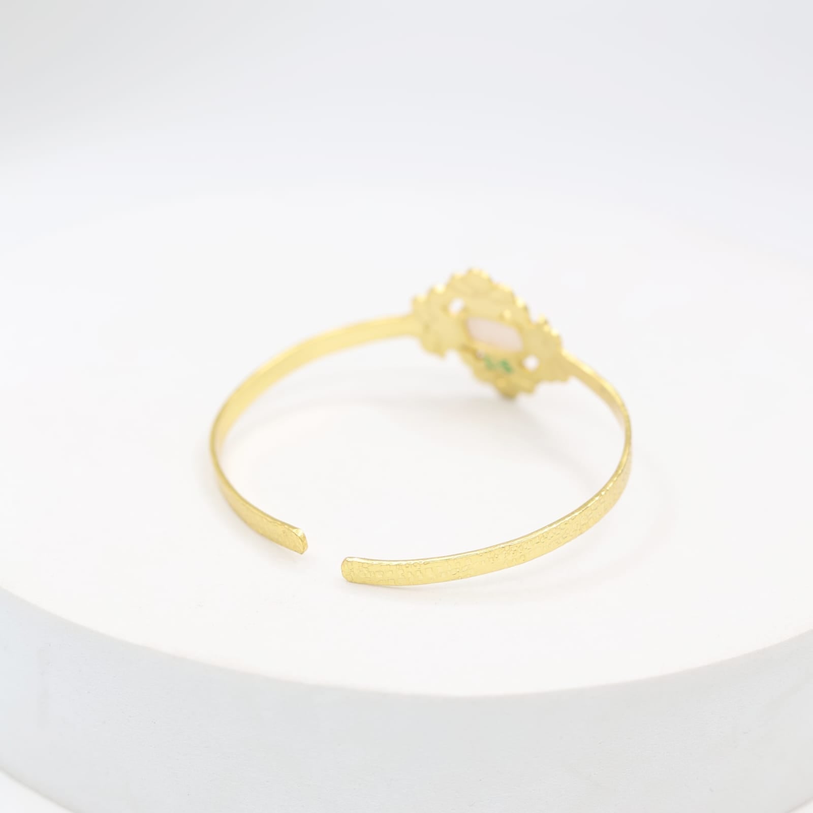 Sterling Silver bracelet with texturing in 1 micron gold plating with rose Quartz stone, adjustable.