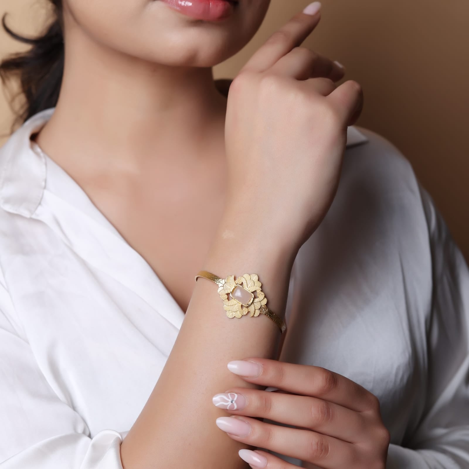 Sterling Silver bracelet with texturing in 1 micron gold plating with rose Quartz stone, adjustable.