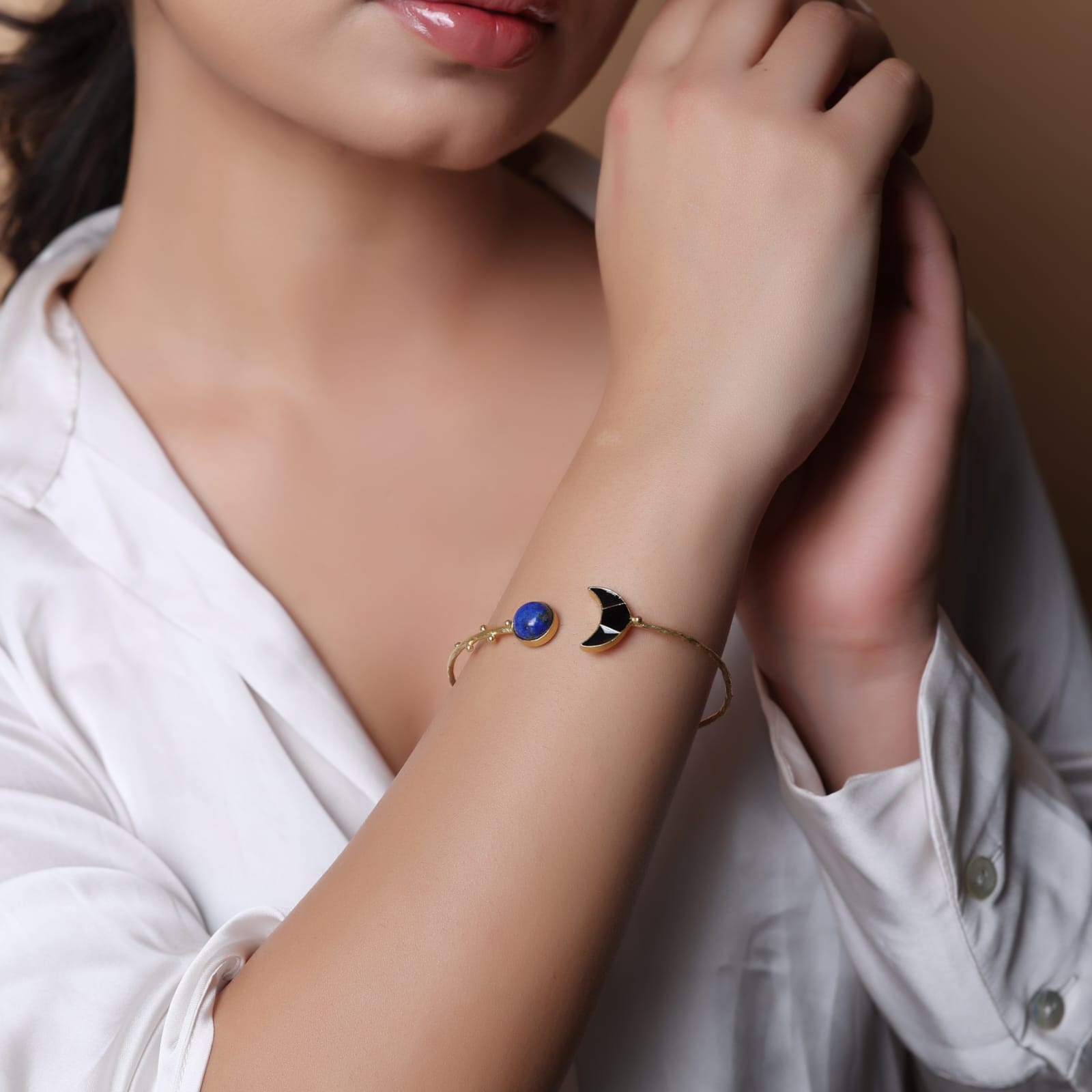 Sterling Silver bracelet with texturing in 1 micron gold plating with Enamelling and Lapis Lazuli stone, adjustable.