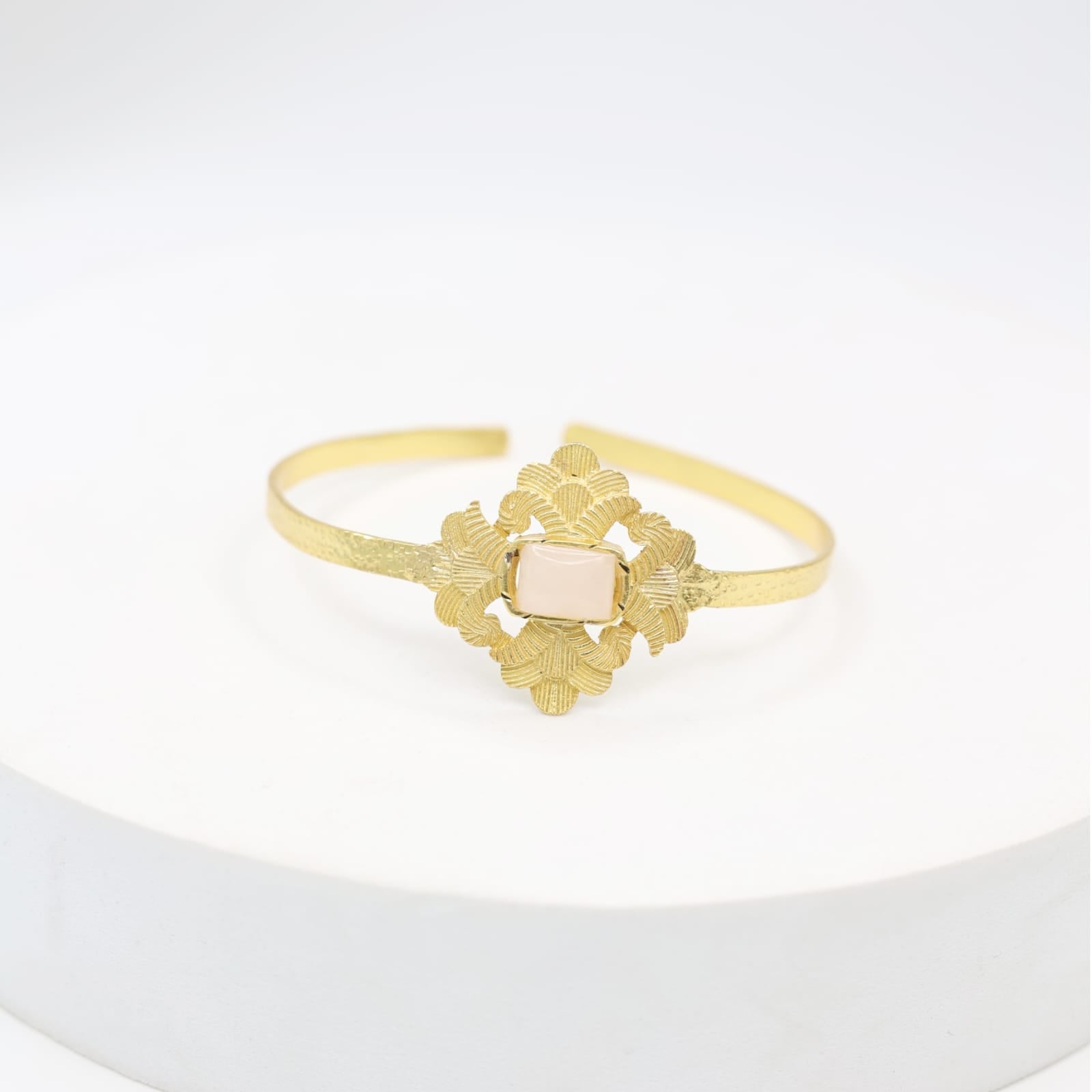 Sterling Silver bracelet with texturing in 1 micron gold plating with rose Quartz stone, adjustable.