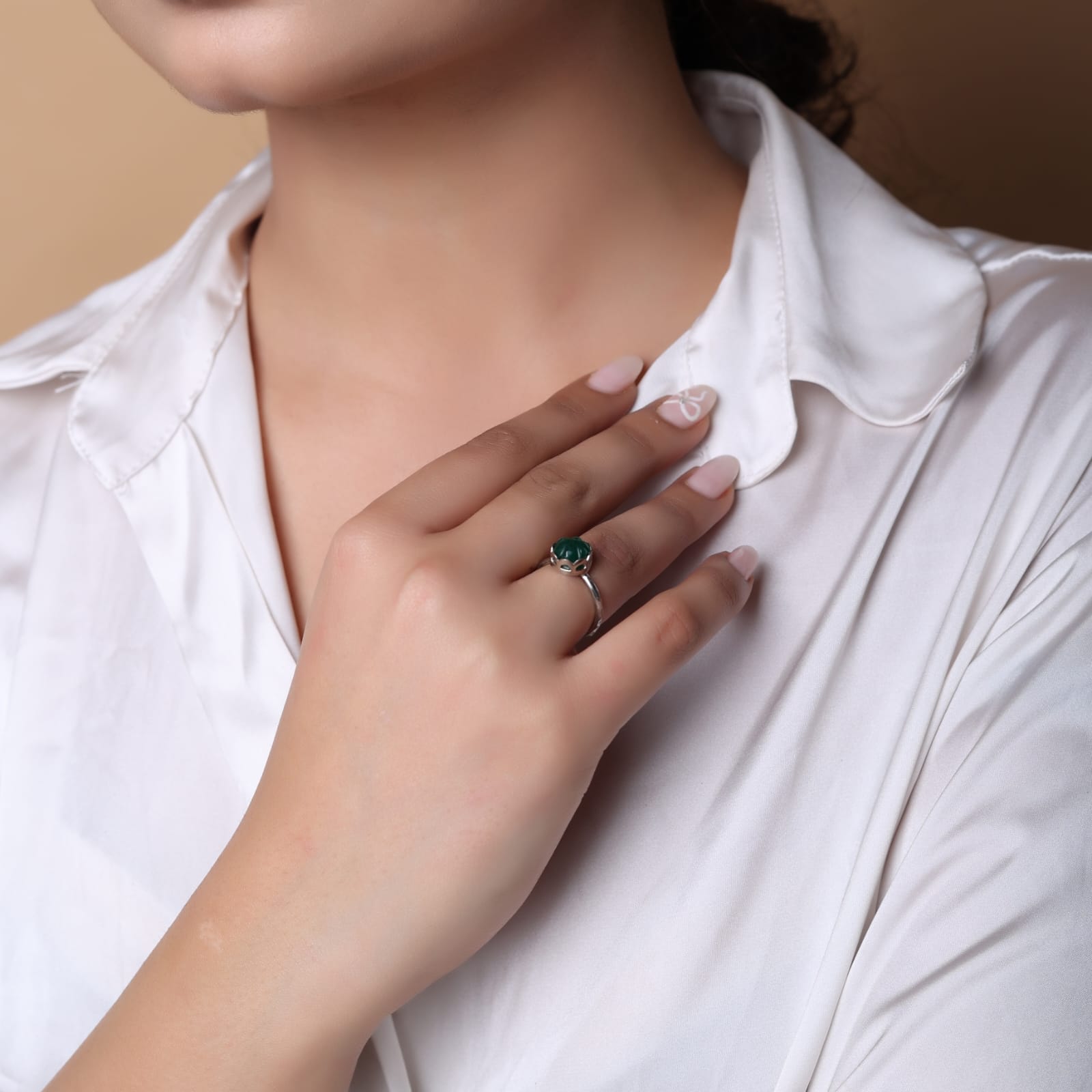 Carved green onyx ring with stones set in sterling Silver.