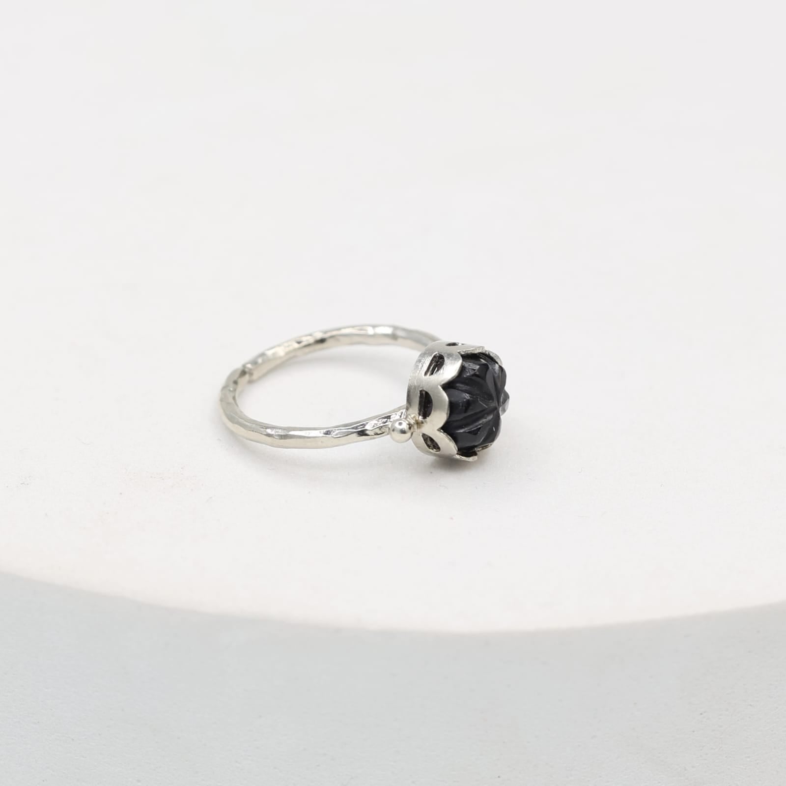 Sterling Silver ring in carved stone with an elegant look, adjustable.