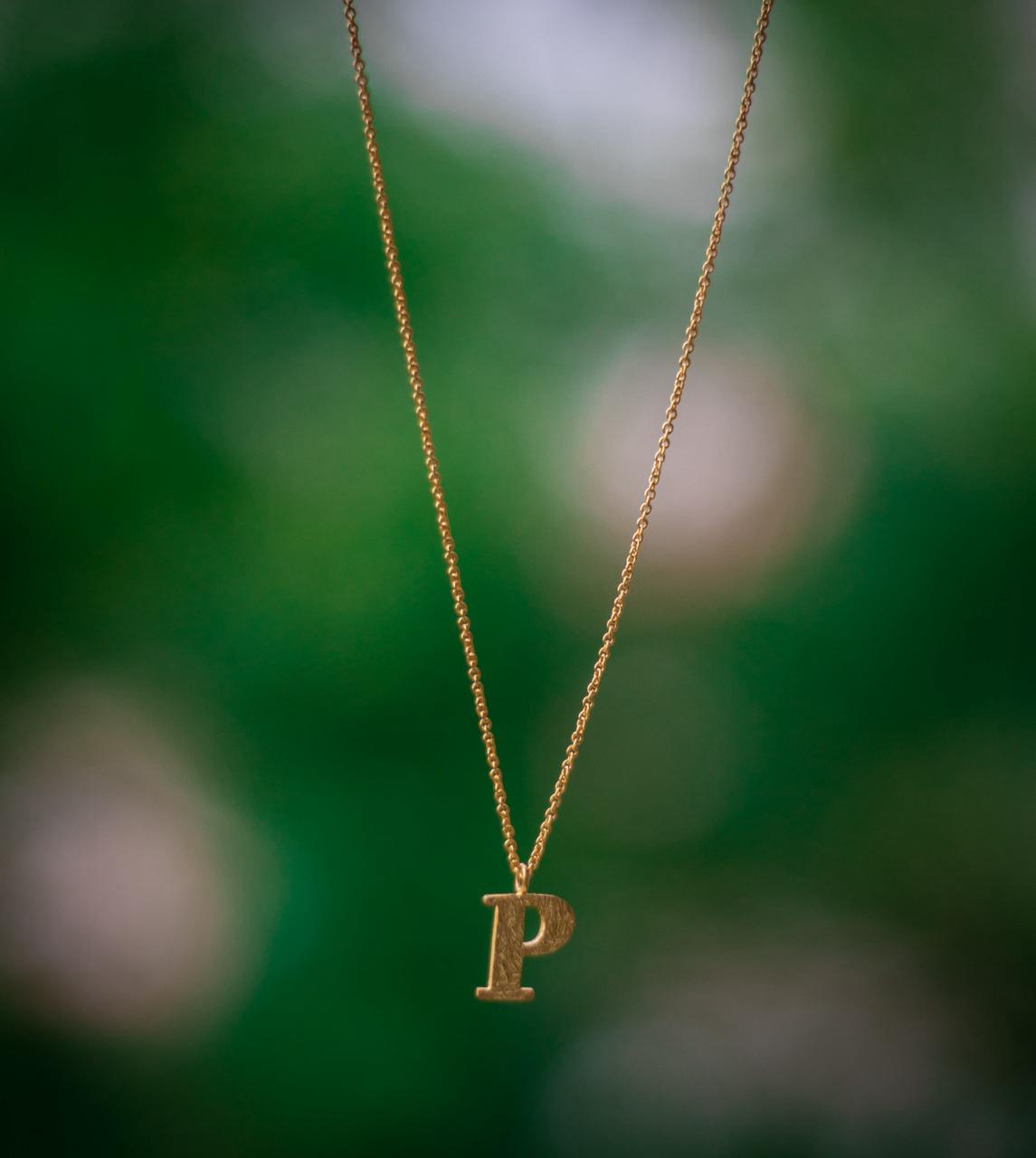 Gold plated Personalized pendant.