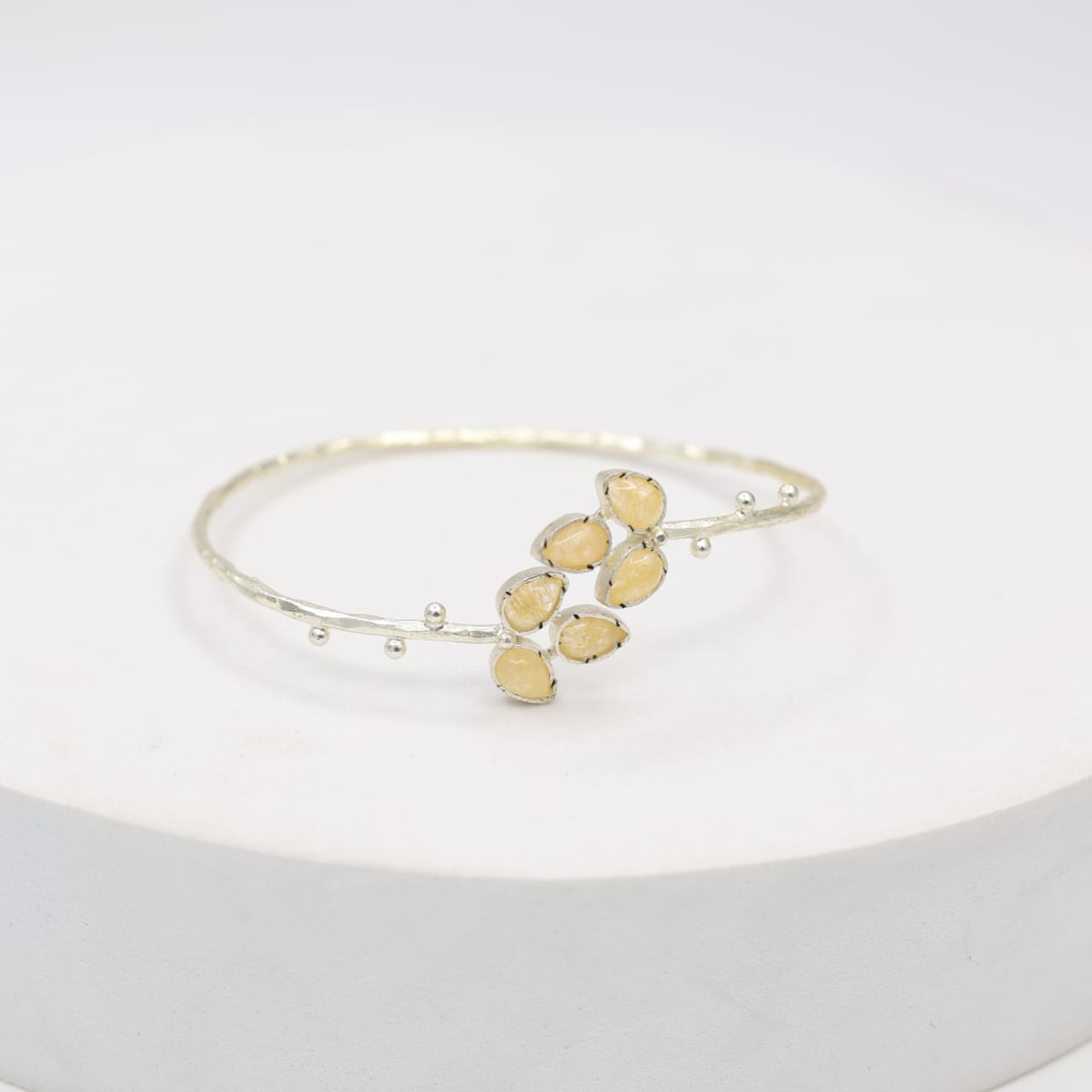 Sterling Silver bracelet with yellow Aventurine stones, adjustable.