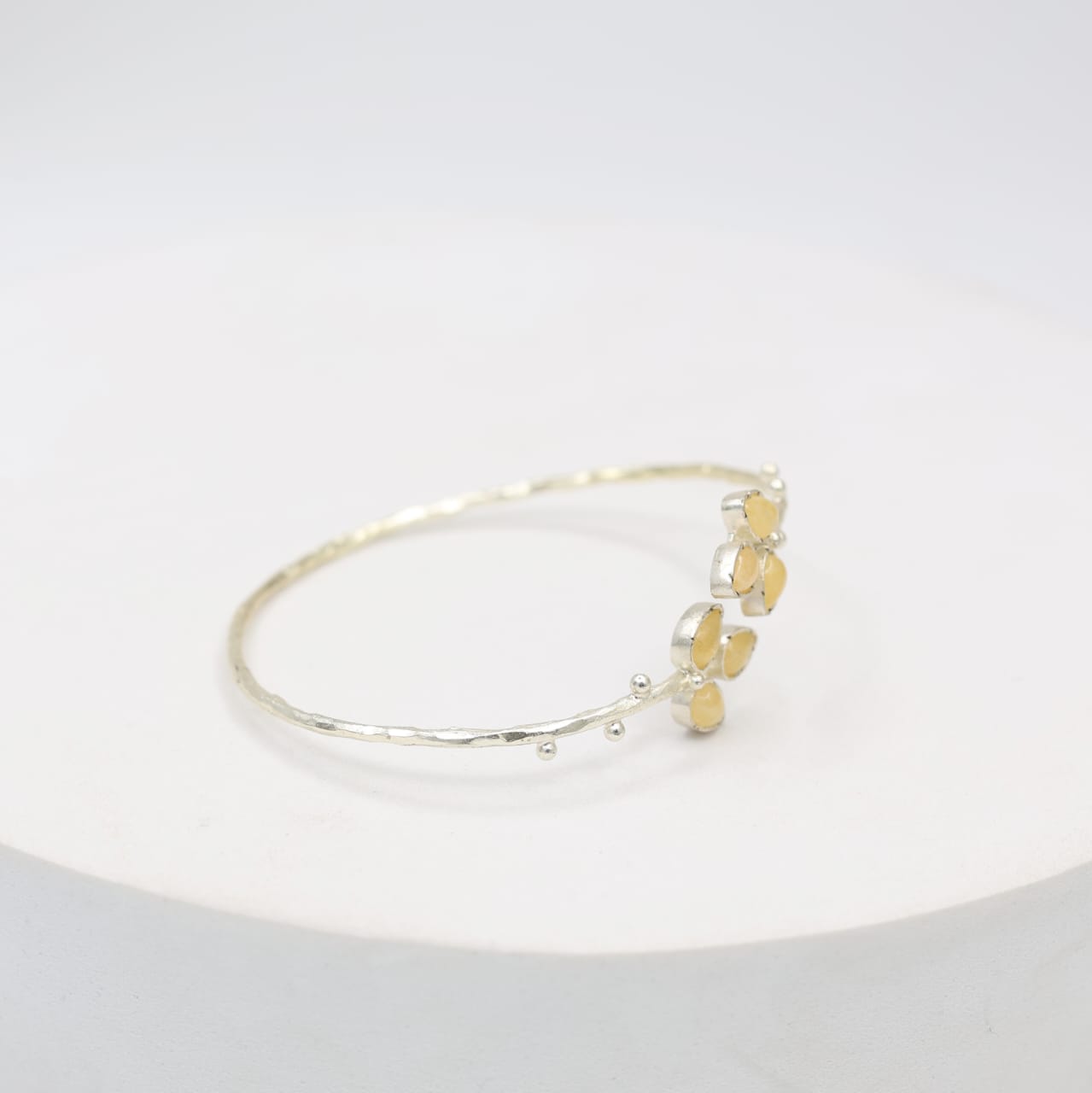 Sterling Silver bracelet with yellow Aventurine stones, adjustable.