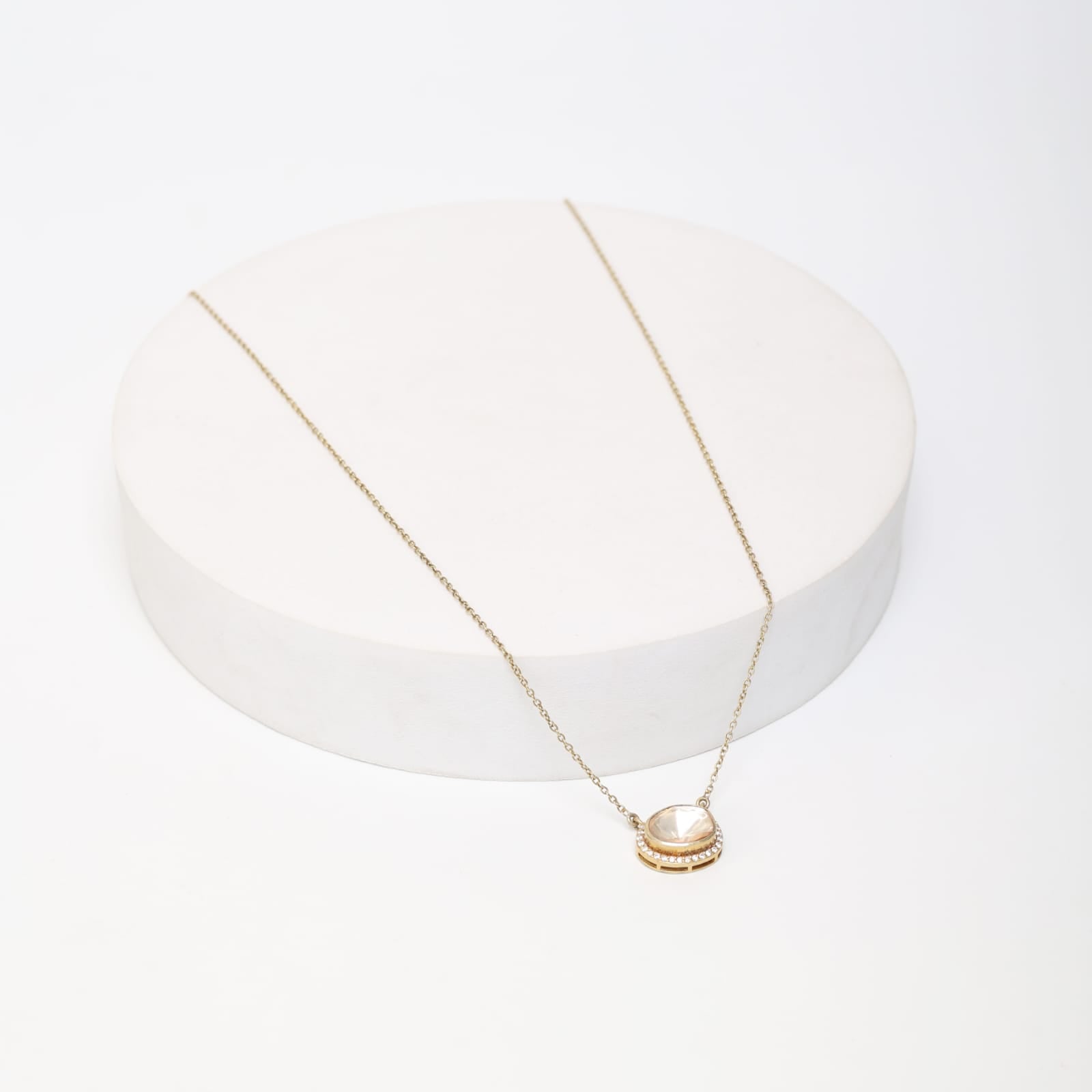 Sterling Silver Gold plated necklace in Moissanite and cz stones with
18 karat Gold plating.