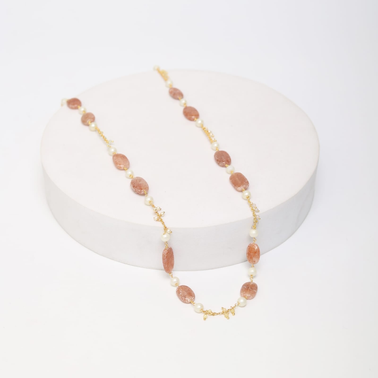 Sterling silver gold plated strung necklace with Onyx and Pearls in 18 karat Gold plating.