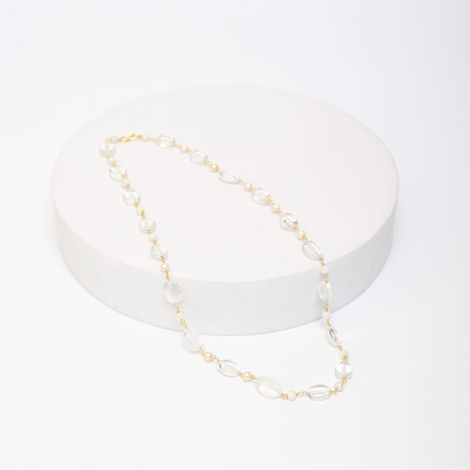 Sterling Silver chain with moonstone and rose quartz in 18 karat Gold plating.