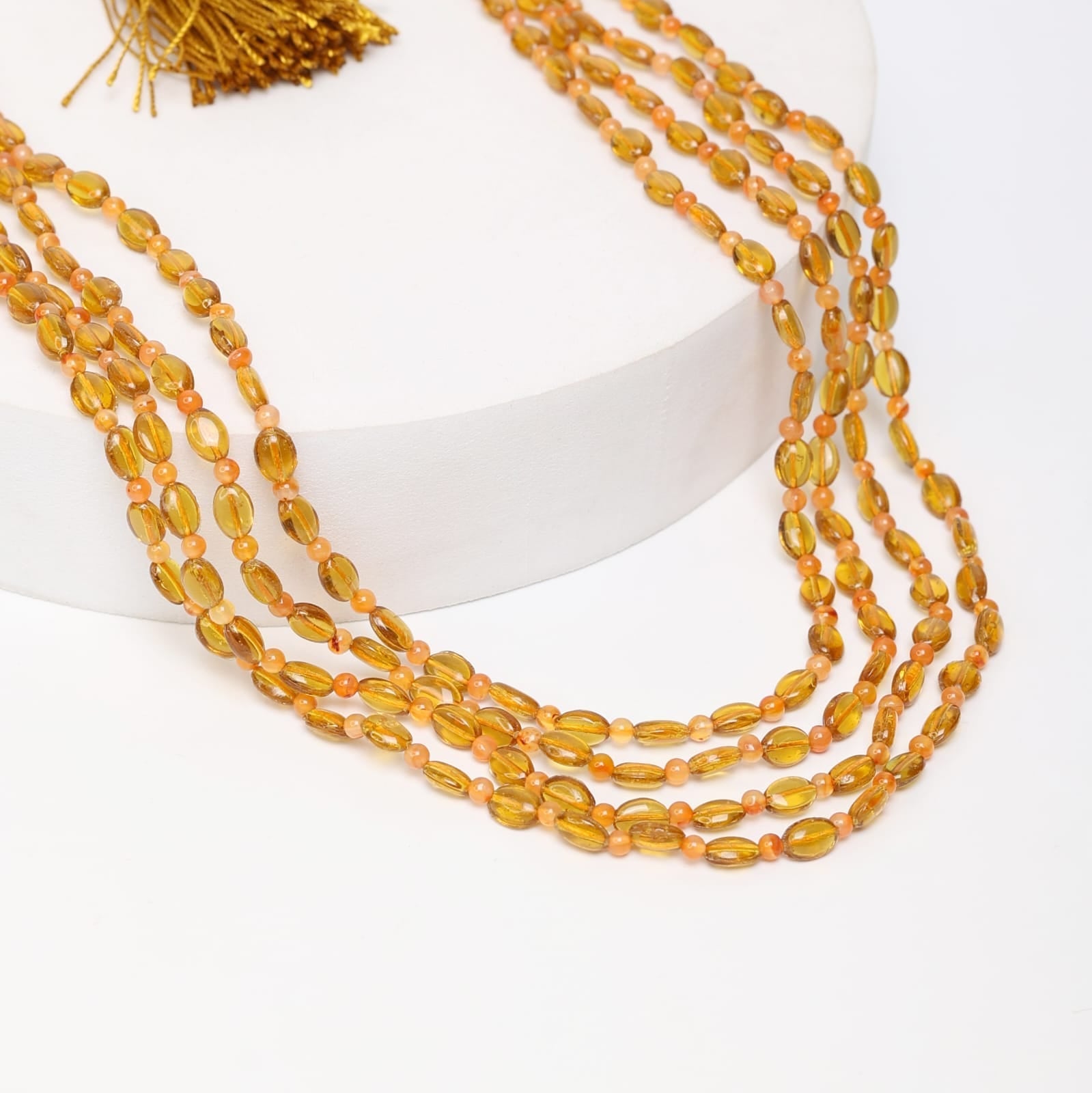 Yellow Quartz and beads in double layered string necklace in Sarafa closure.
Length: 18-20 inches.