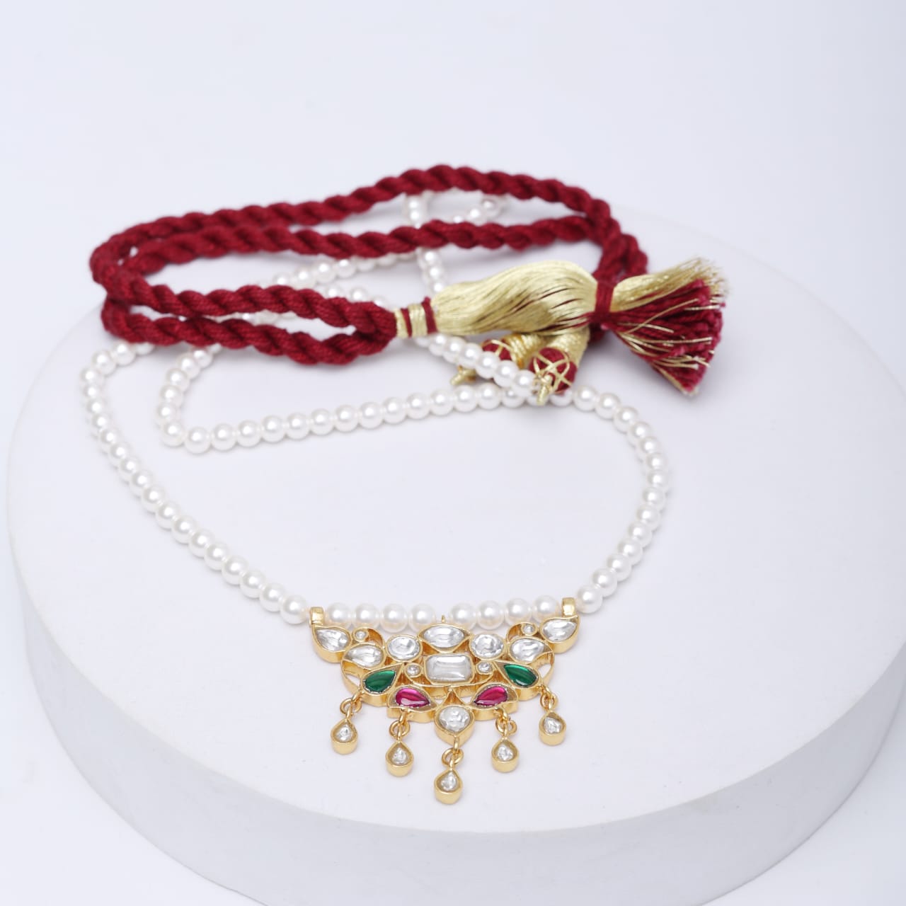 Tanmaniya necklace in Sterling silver with glass Polki and Swarosky Pearls.