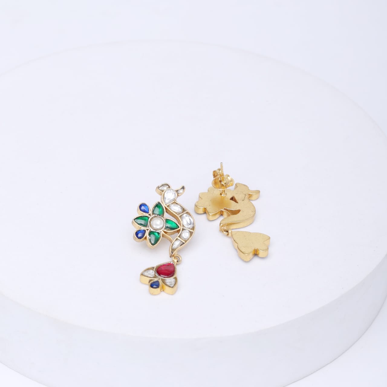Mayur drop earrings in Sterling Silver with blue, red, green Jadau stones and Billor Polki in 18 k micron Gold plating in Pin-Post closure.
