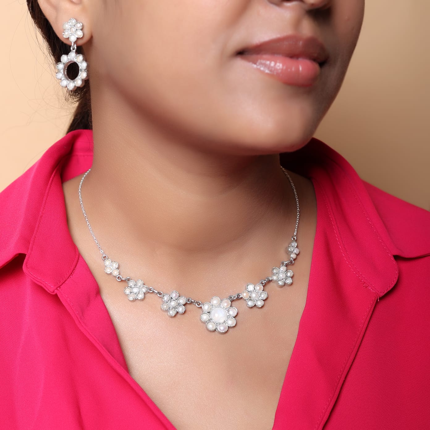 92.5 Sterling Silver earrings with pearls in Post-Push closure.