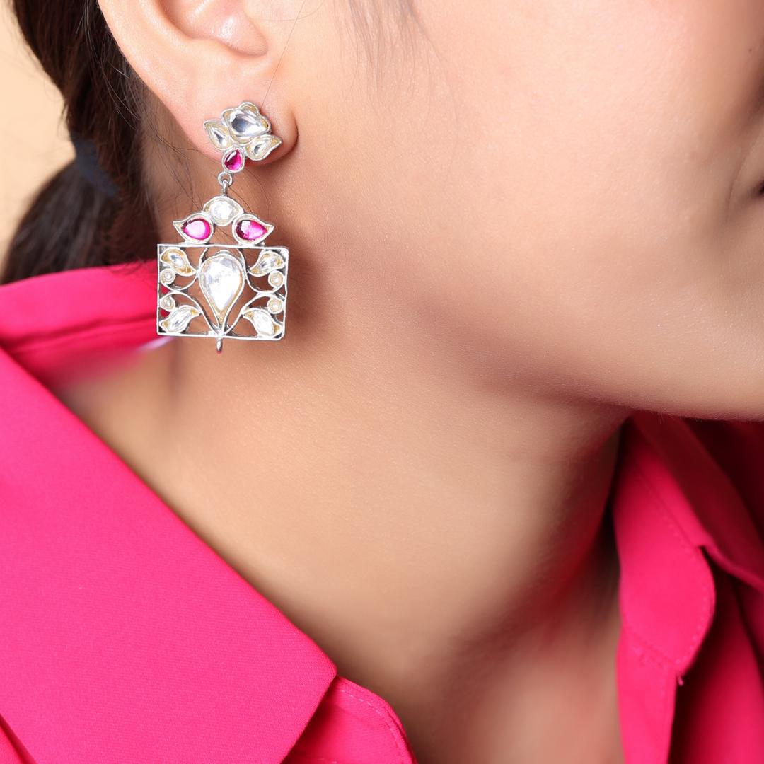 Parag earrings in 92.5 Sterling Silver Jadau earrings with Billor Polki and red Quartz faceted jadau stones in Push and Post closure.