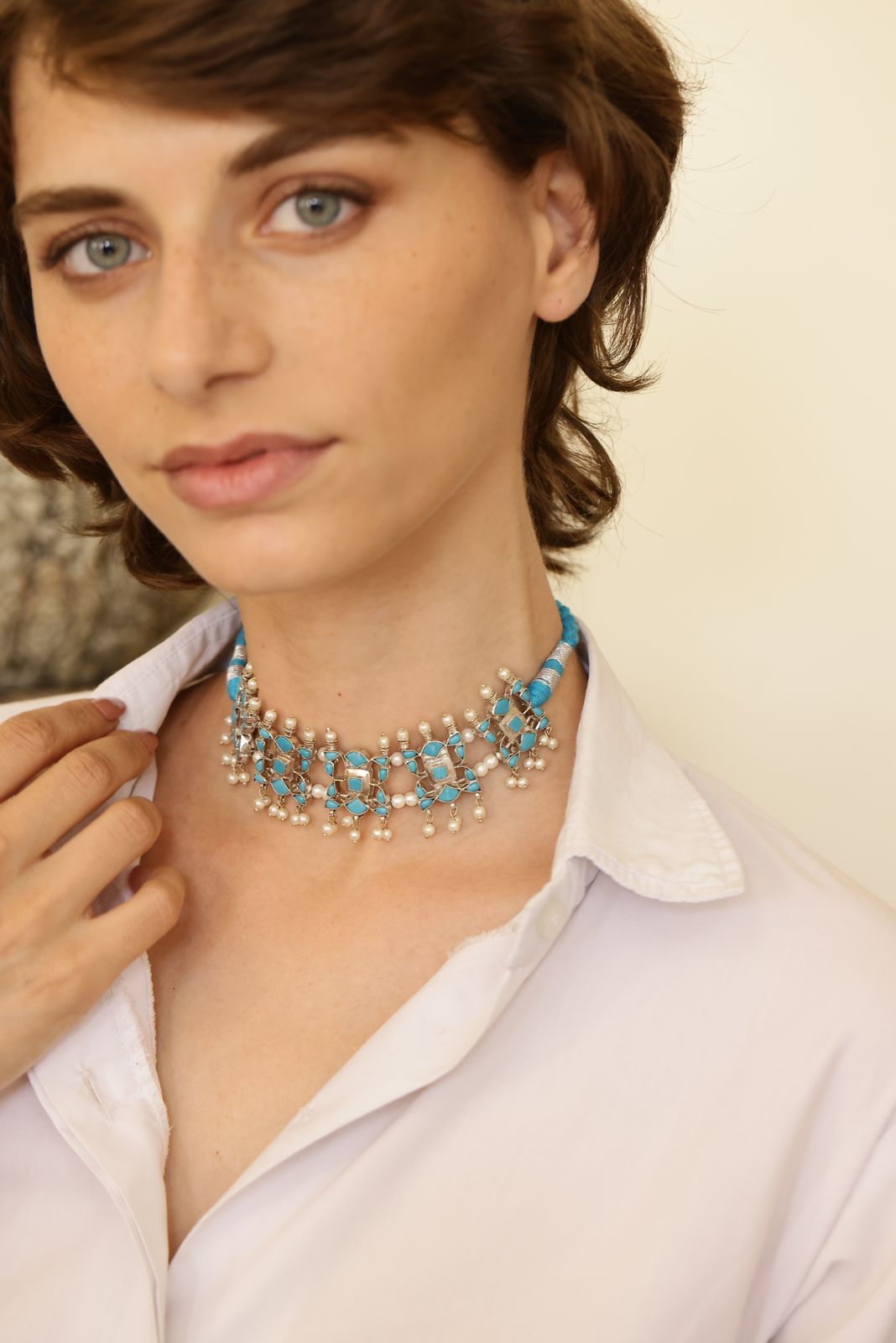 Neela choker in 92.5 Sterling Silver with Recon Turquoise stones in Pearl drops with blue and Silver sarafa closure.