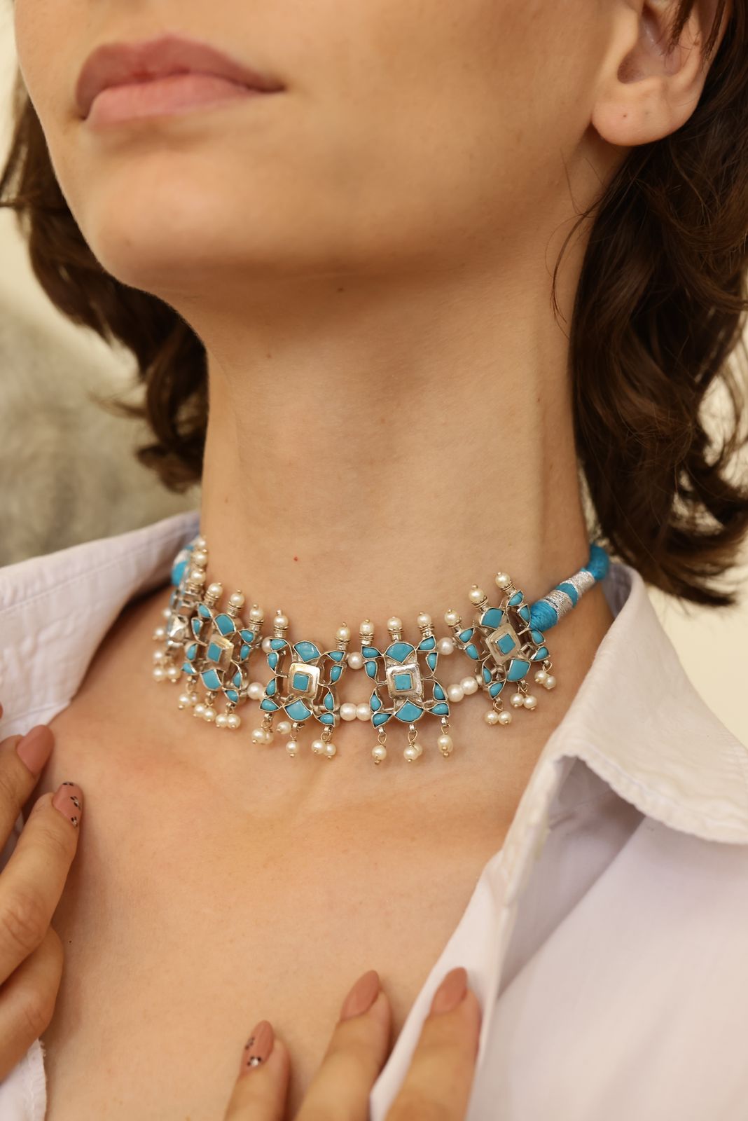 Neela choker in 92.5 Sterling Silver with Recon Turquoise stones in Pearl drops with blue and Silver sarafa closure.