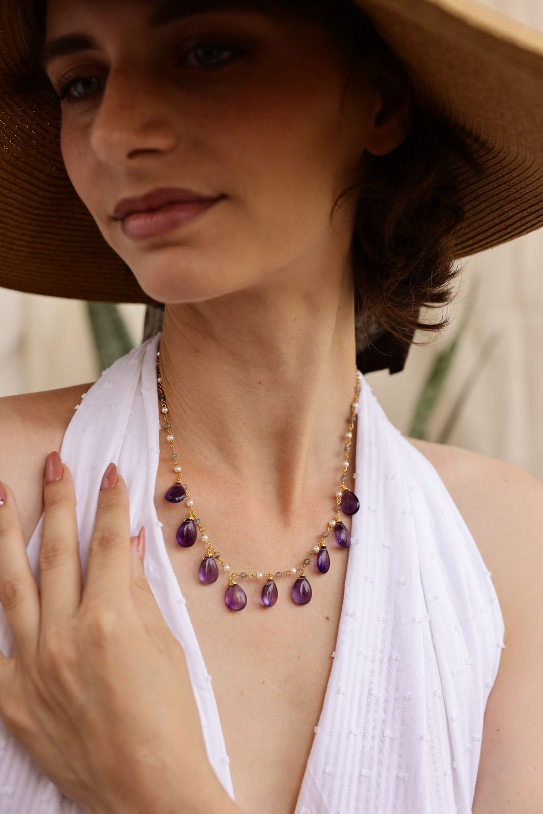 Raindrops necklace in 92. 5 Sterling Silver with Amethyst strung with Labradorite and Pearls in 1 micron Gold plating.
Length- 16-18 inches adjustable.